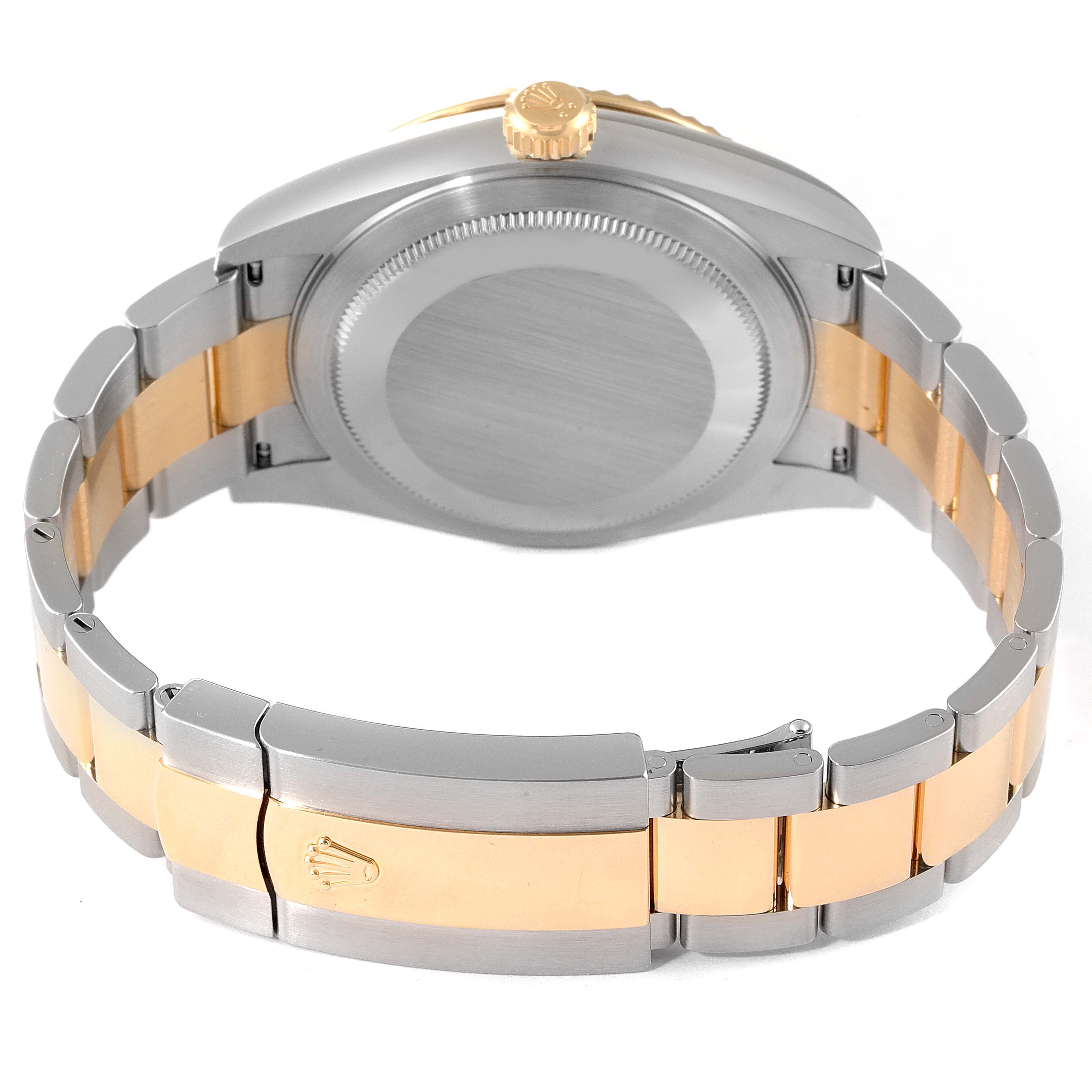 This image shows the back view of a Rolex Sky-Dweller 326933 Men's Steel and Gold (two tone) Champagne Dial 326933 Men's Steel and Gold (two tone) Champagne Dial watch, highlighting its two-tone bracelet and clasp.