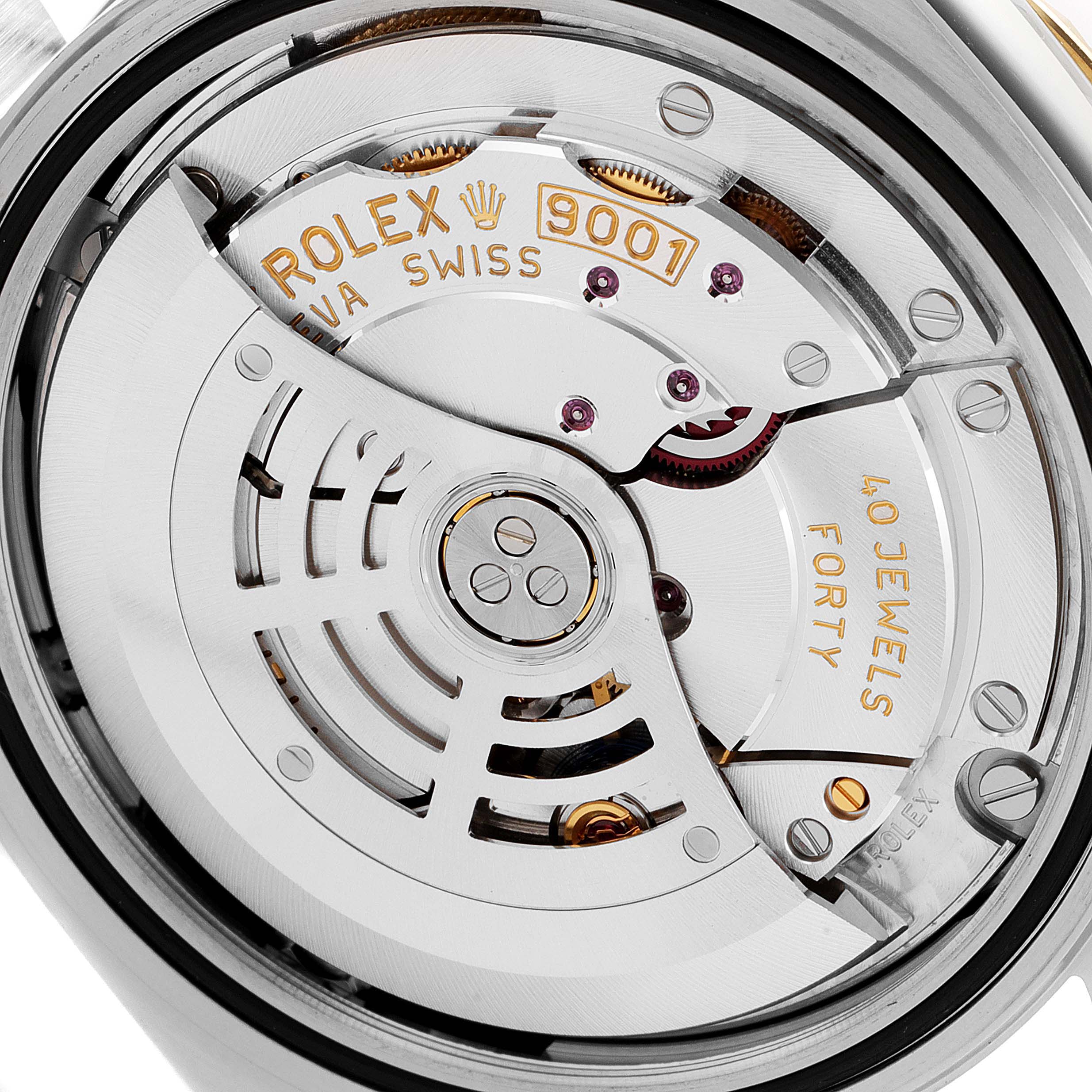 This image shows a close-up view of the movement mechanism of a Rolex Sky-Dweller 326933 Men's Steel and Gold (two tone) Champagne Dial 326933 Men's Steel and Gold (two tone) Champagne Dial watch.