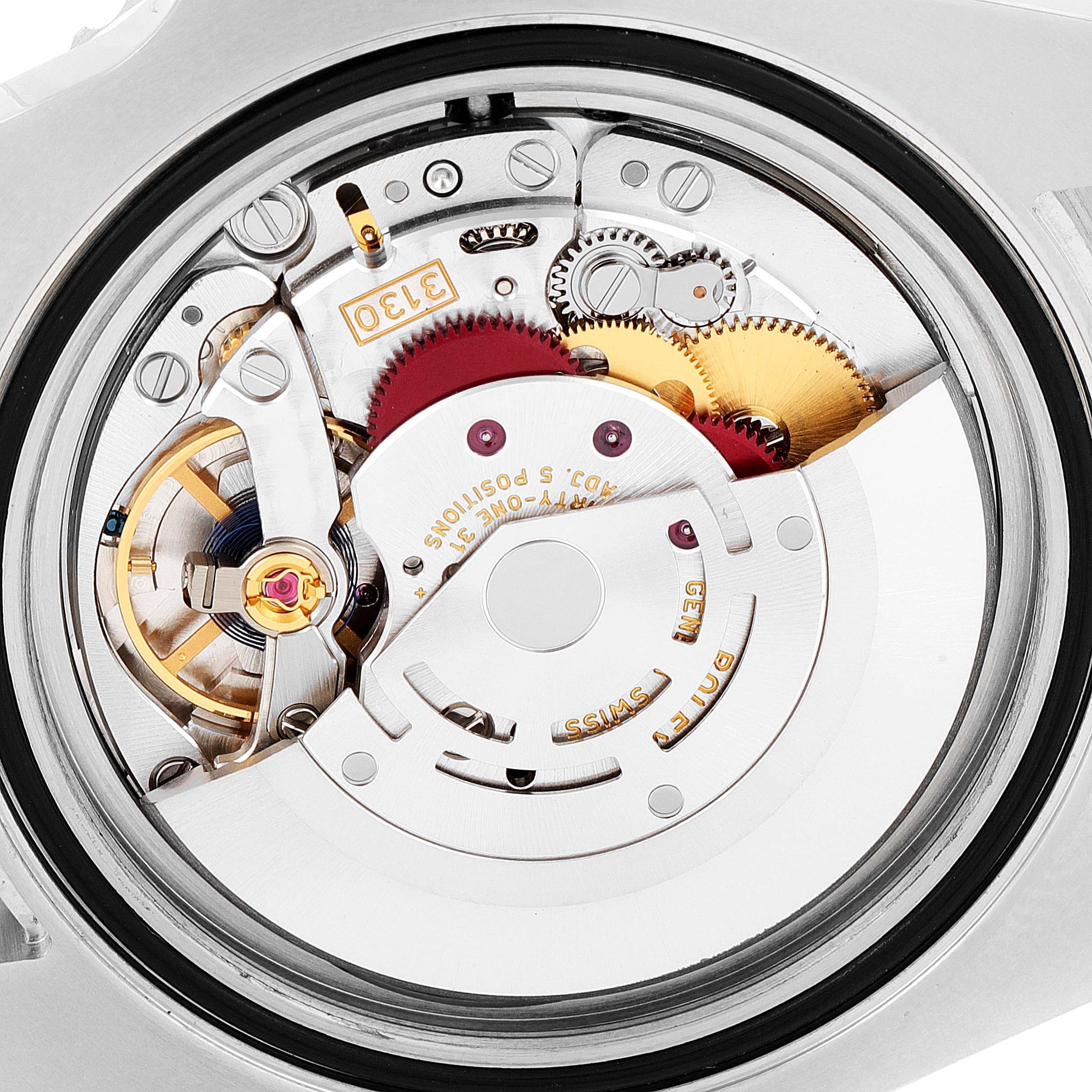 This image shows a close-up view of the intricate movement and internal components of a Rolex Submariner 114060 Men
s Stainless Steel Black Dial 114060 Men
s Stainless Steel Black Dial watch.