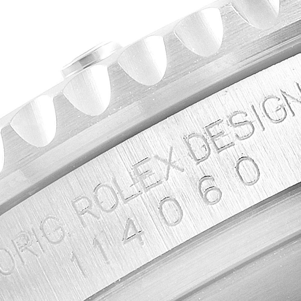 This close-up image showcases the side view, including the engraved serial number and the edge of the bezel on a Rolex Submariner 114060 Men
s Stainless Steel Black Dial 114060 Men
s Stainless Steel Black Dial.