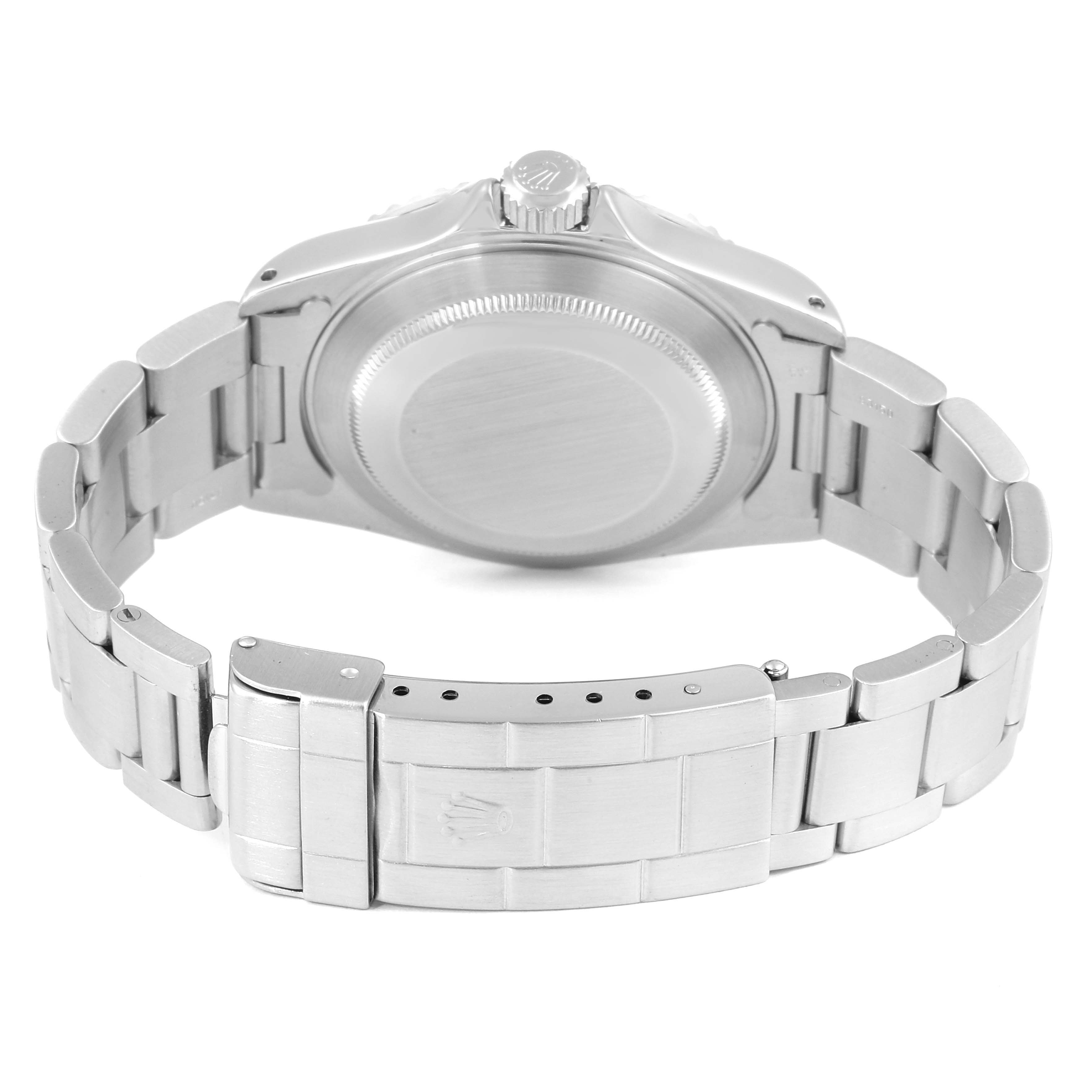 The image shows the back case and bracelet of a Rolex Submariner 14060 Men's Stainless Steel Black Dial 14060 Men's Stainless Steel Black Dial watch from a rear angle.