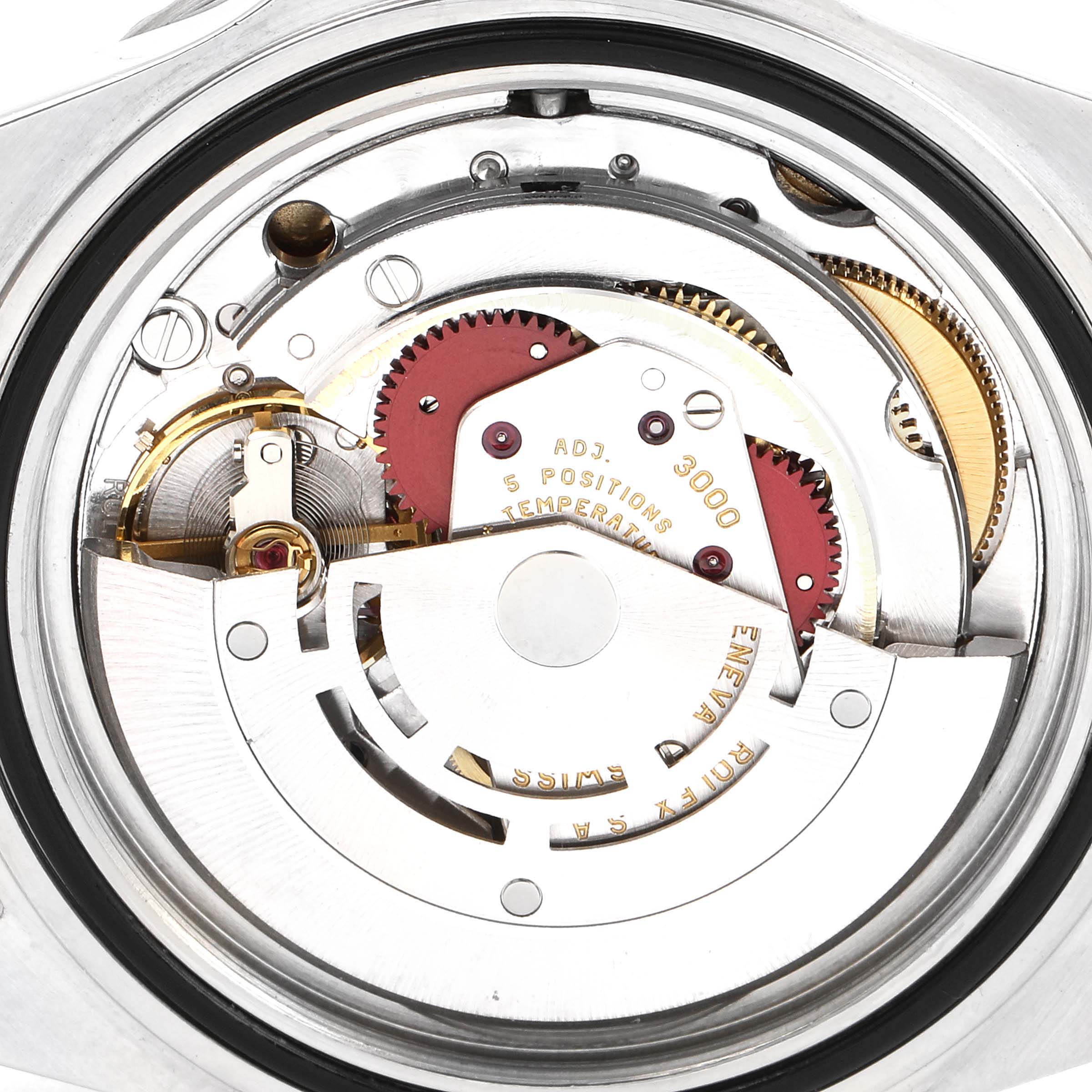 This is a close-up view of the movement components inside a Rolex Submariner 14060 Men's Stainless Steel Black Dial 14060 Men's Stainless Steel Black Dial watch.