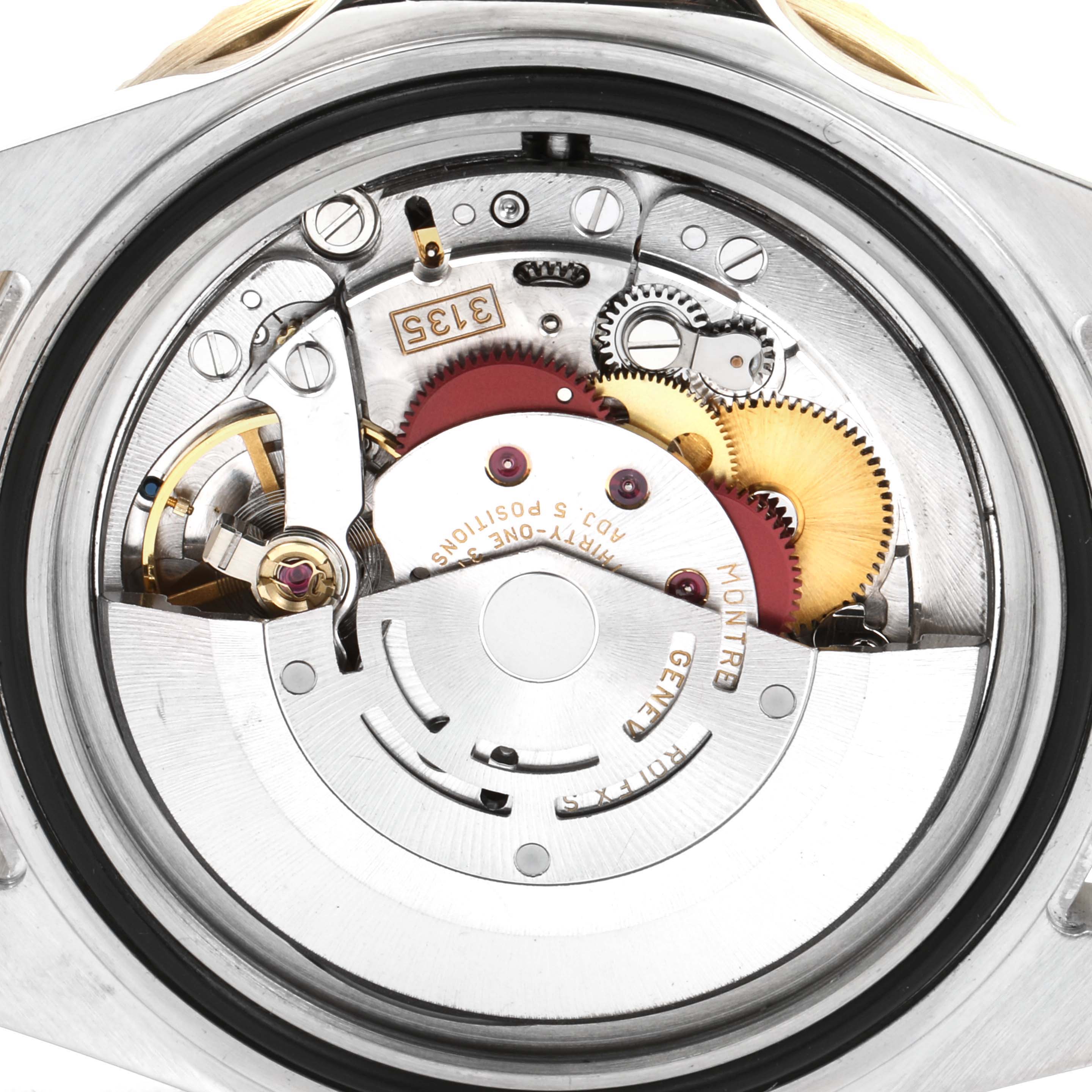 This image shows the internal mechanism of the Rolex Submariner 16613 Men's Steel and Gold (two tone) Black Dial 16613 Men's Steel and Gold (two tone) Black Dial watch from a rear view.