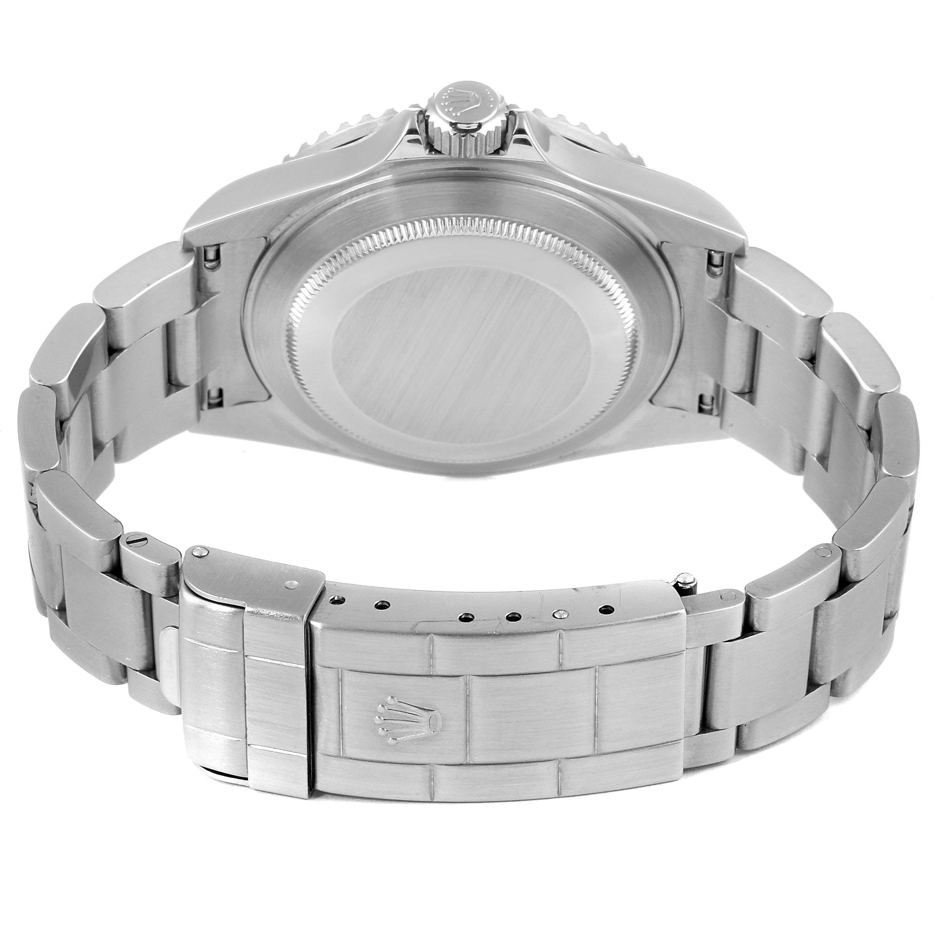 The image shows the back view of a Rolex Submariner 16610 Men's Stainless Steel Black Dial 16610 Men's Stainless Steel Black Dial watch, highlighting its bracelet and clasp.