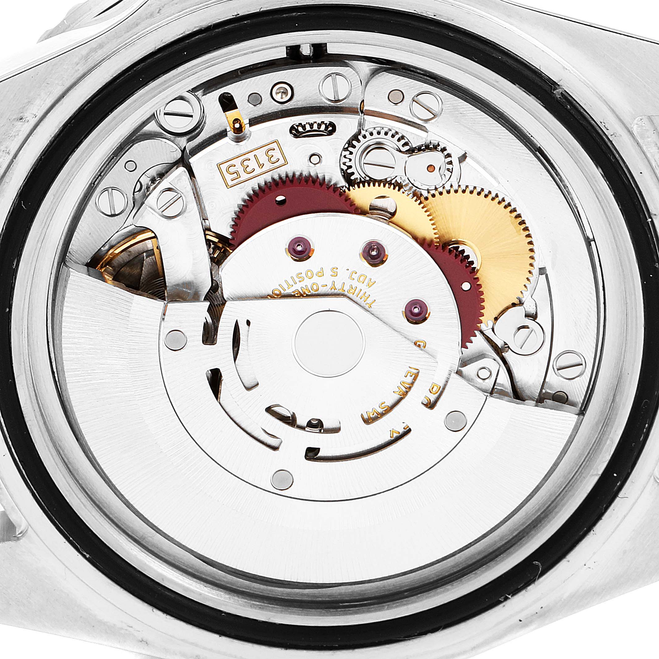 This image shows a detailed view of the movement and internal mechanics of a Rolex Submariner 16610 Men's Stainless Steel Black Dial 16610 Men's Stainless Steel Black Dial watch from the back.