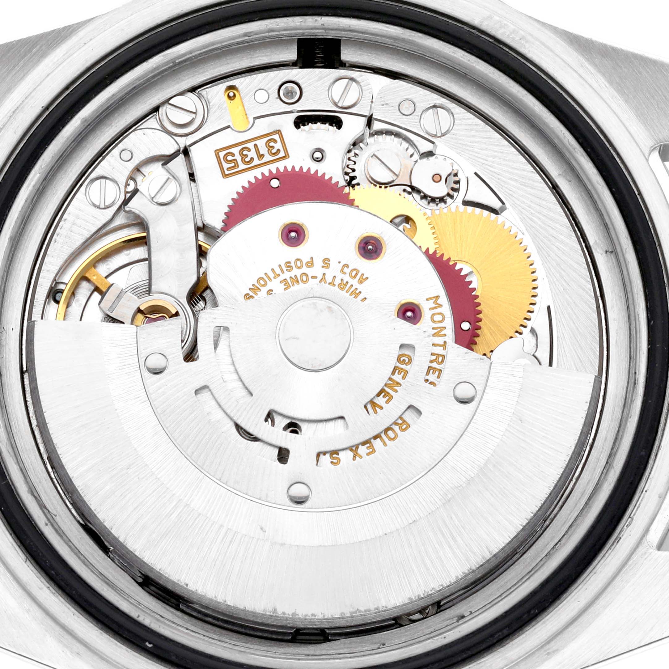 The image shows the Rolex Submariner 16610 Men's Stainless Steel Black Dial 16610 Men's Stainless Steel Black Dial's movement from the back, highlighting gears and mechanical components.