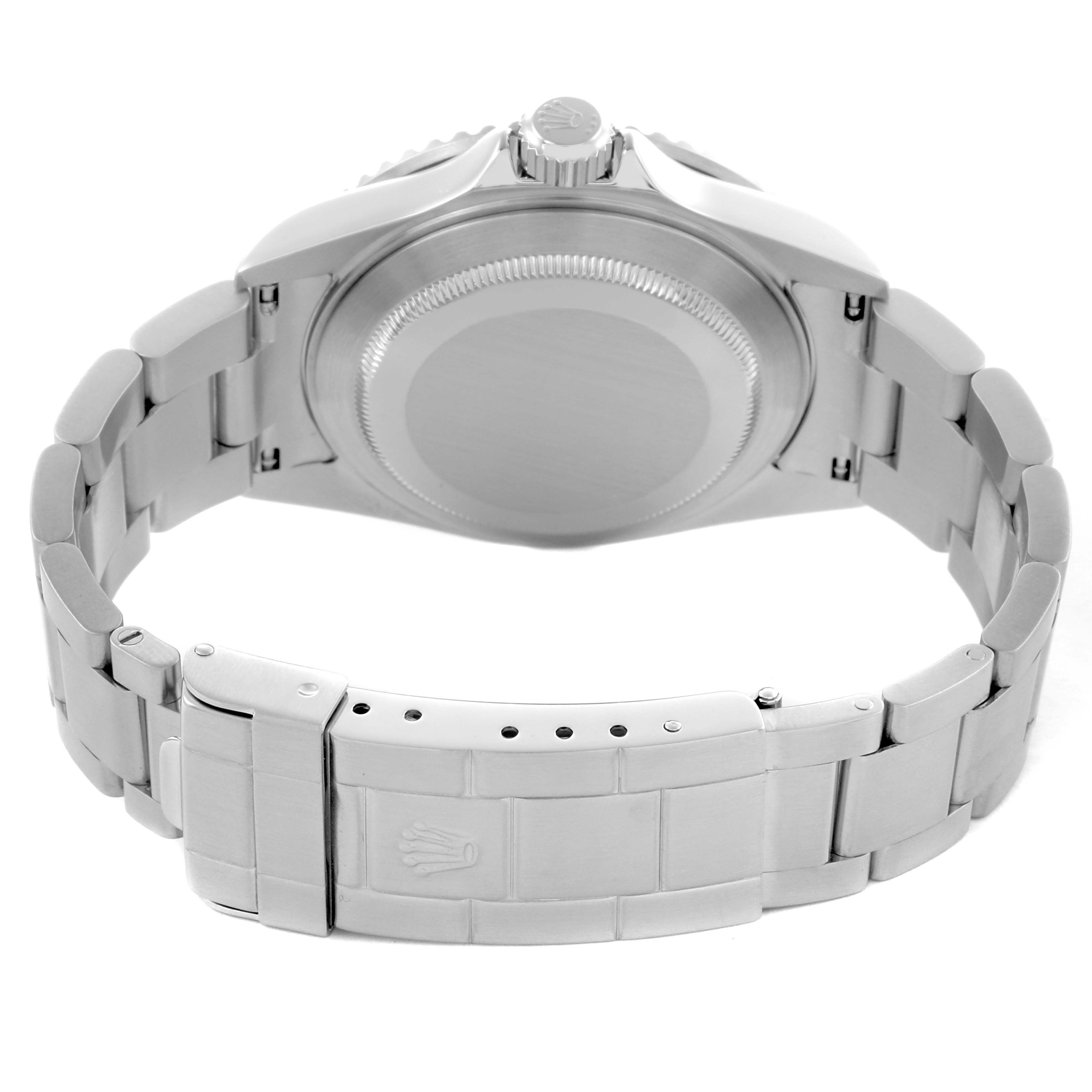 The Rolex Submariner 16610 Men's Stainless Steel Black Dial 16610 Men's Stainless Steel Black Dial watch is shown from the back, highlighting the case back, bracelet, and clasp.