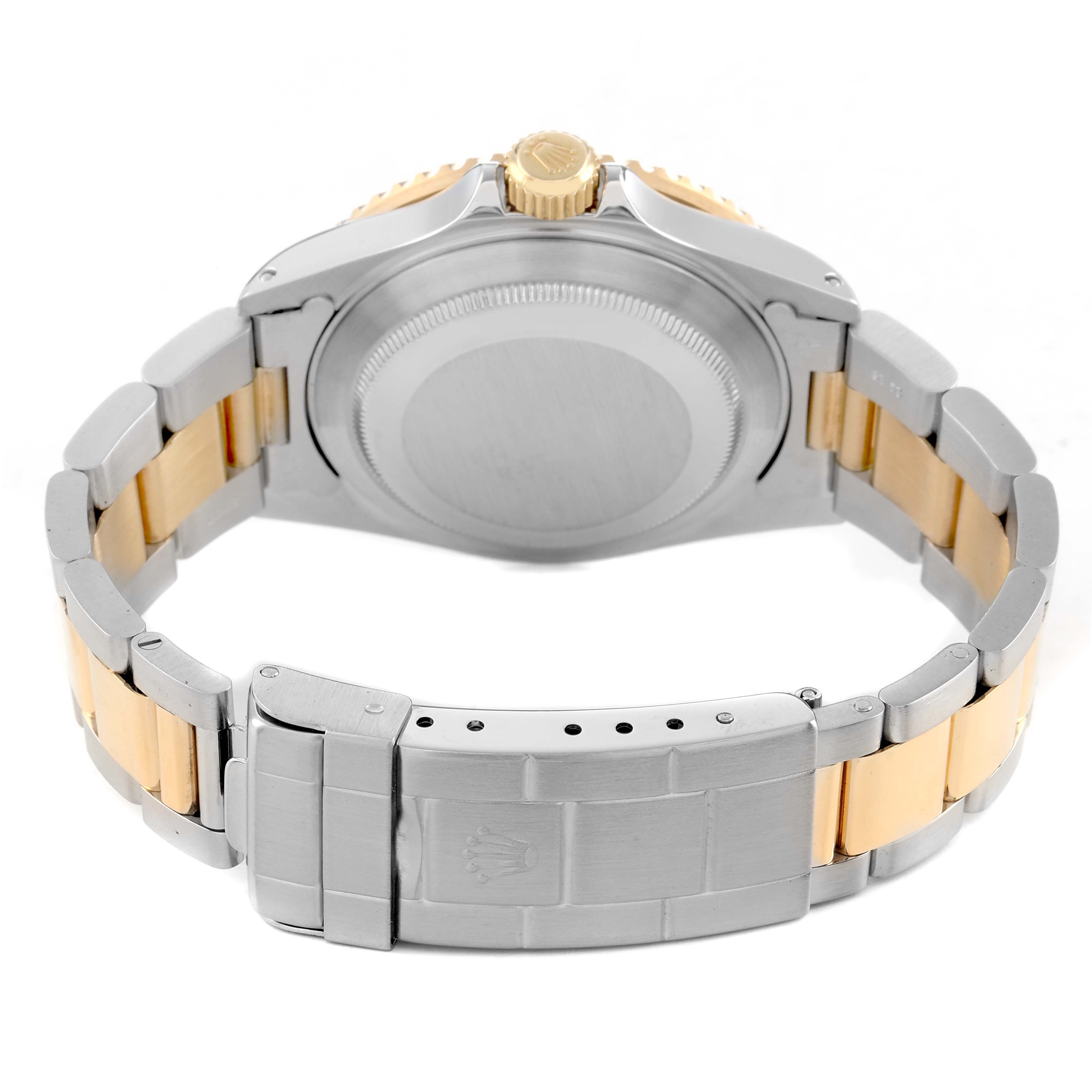 The image shows the back of a Rolex Submariner 16613 Men's Steel and Gold (two tone) Black Dial, highlighting the case back, bracelet, and clasp.