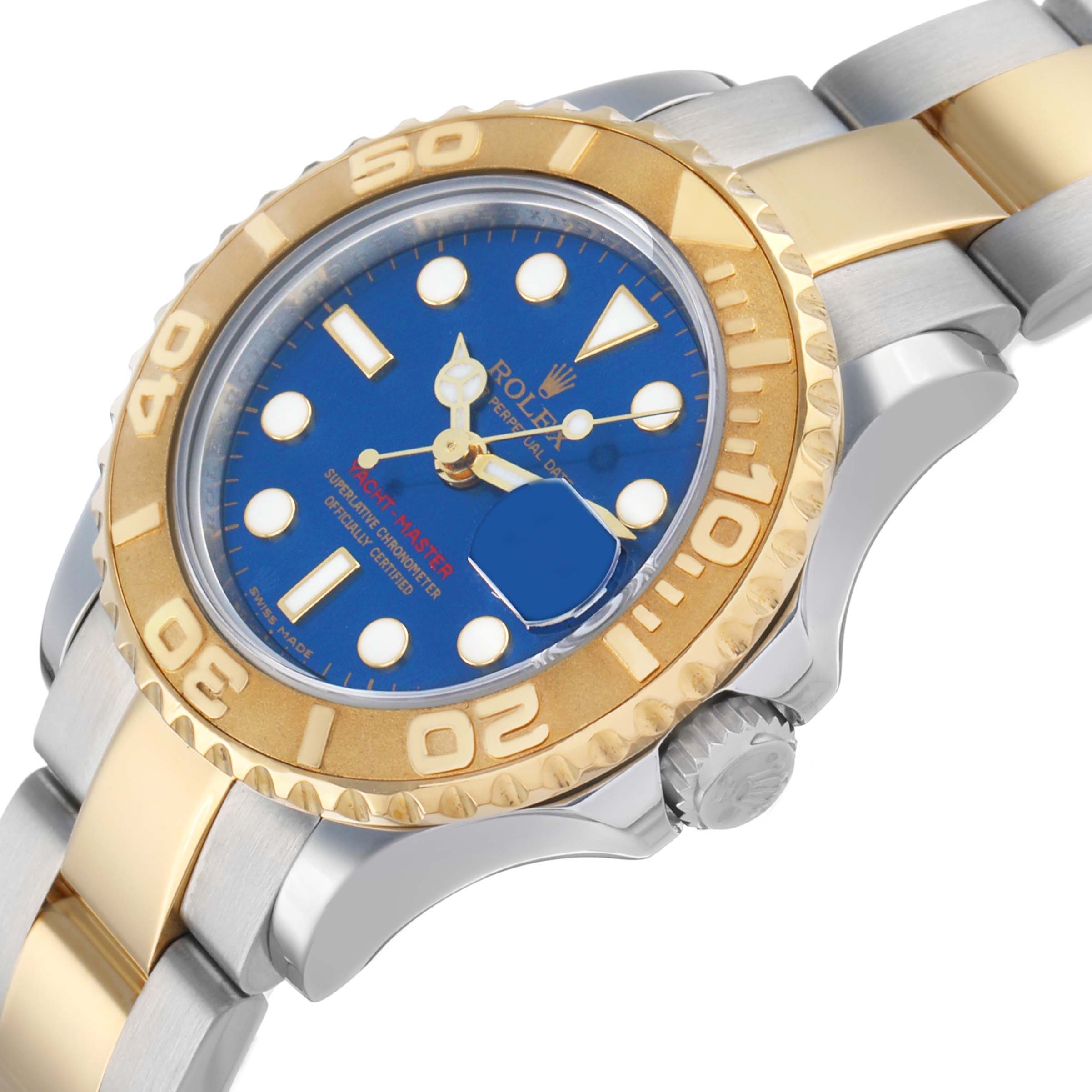 The image shows a Rolex Yacht-Master 169623 Women's Steel and Gold (two tone) Blue Dial watch at an angled top view, highlighting the gold bezel and blue dial.