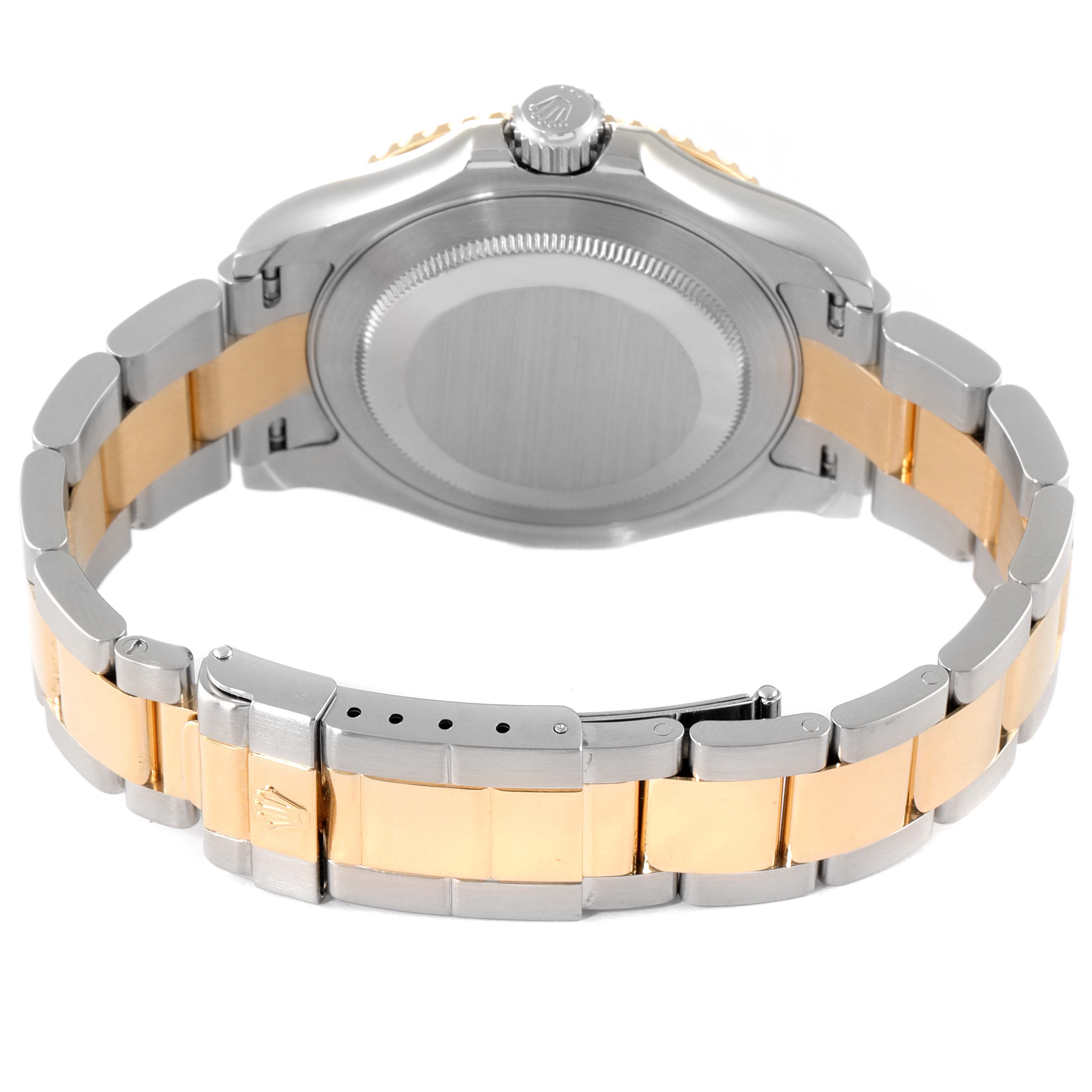 This image shows the back and clasp of a Rolex Yacht-Master 16623 Men's Steel and Gold (two tone) Mother of Pearl Dial 16623 Men's Steel and Gold (two tone) Mother of Pearl Dial watch, featuring a two-tone metal bracelet.