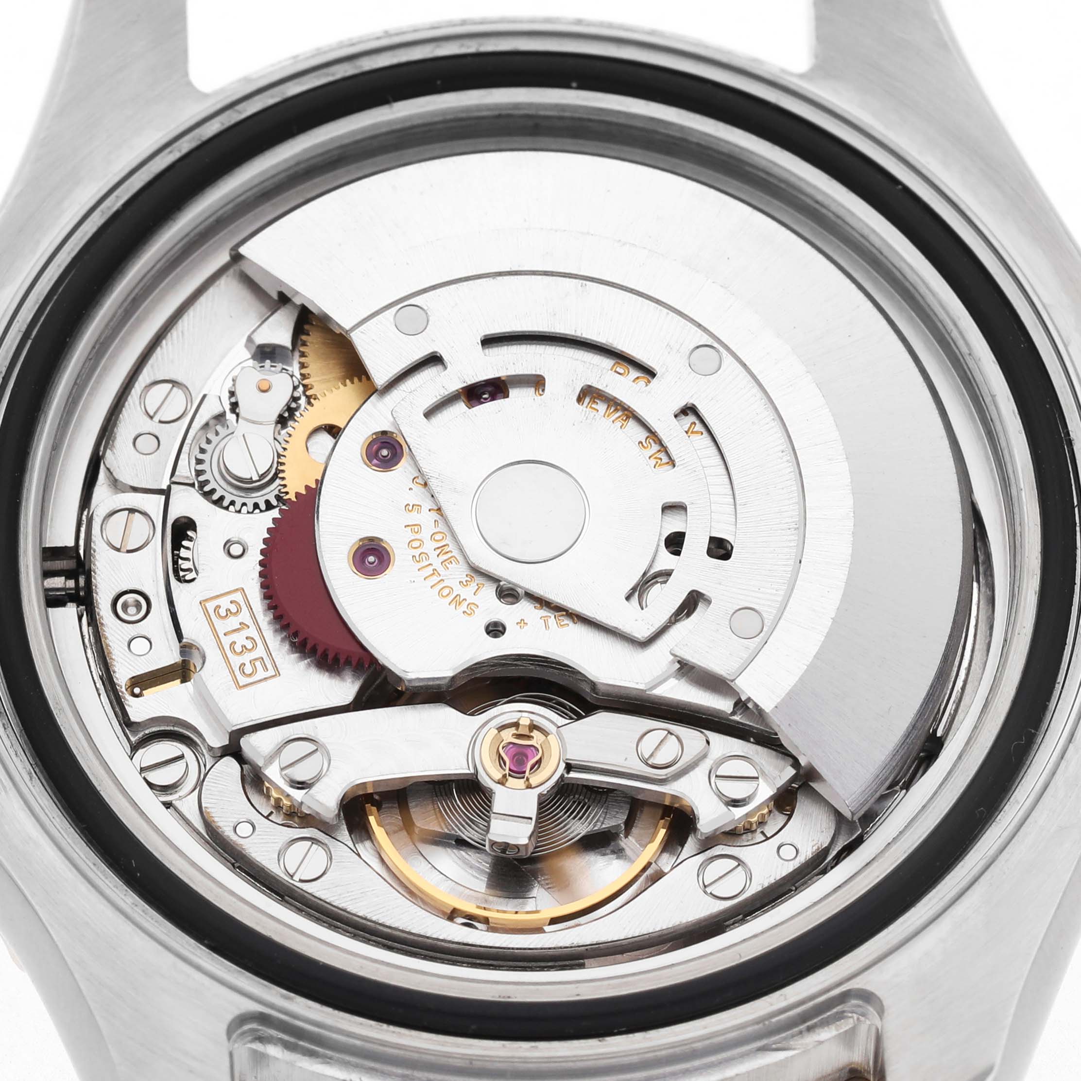 The image shows the movement mechanism of a Rolex Yacht-Master 77099 Men's Steel and Gold (two tone) Champagne Dial watch from a top-down angle.