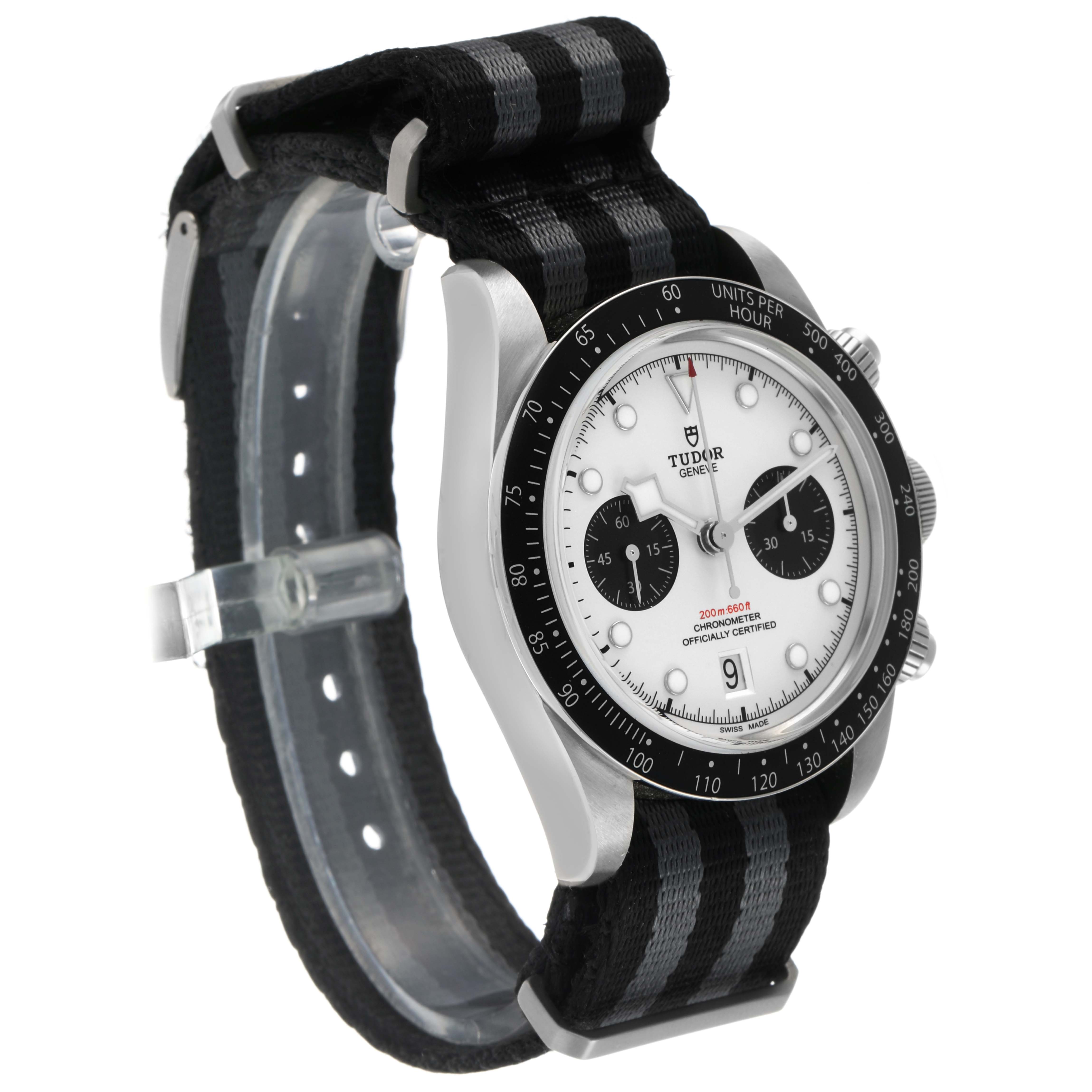 The Tudor Heritage Chrono 79360 Men's Stainless Steel Silver Dial watch is shown at a three-quarter angle, highlighting its bezel, dial, and NATO strap.