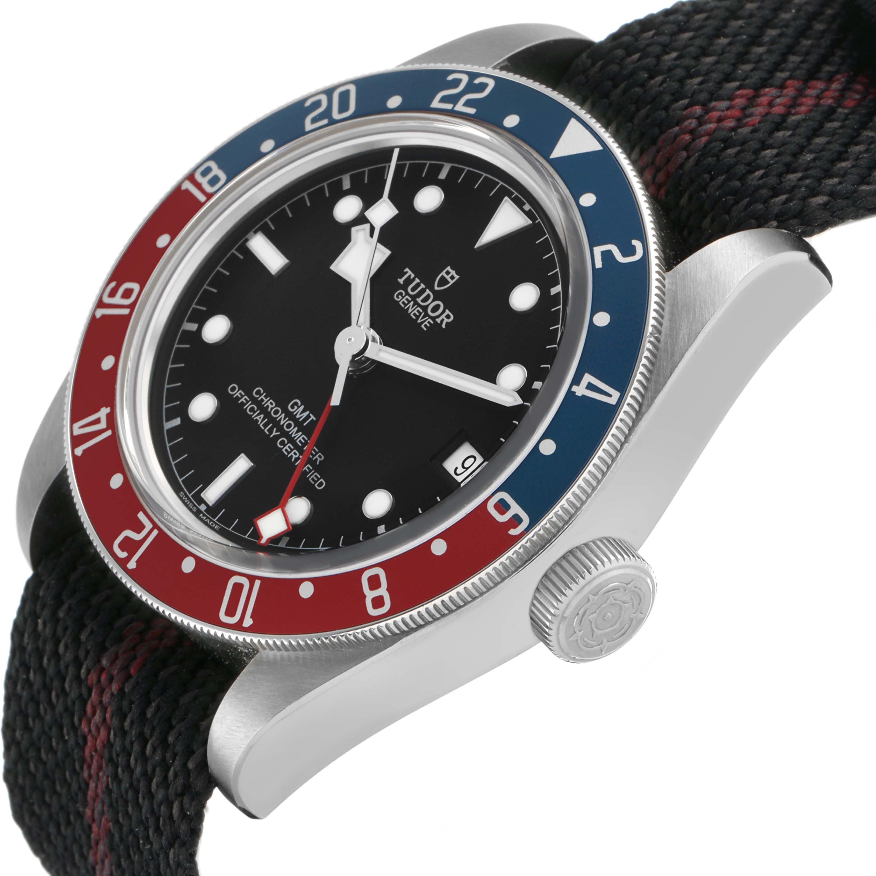 The angled image shows the Tudor Heritage Black Bay 79830RB Men's Stainless Steel Black Dial watch face, crown, and bezel, with a black dial and red-blue GMT bezel.