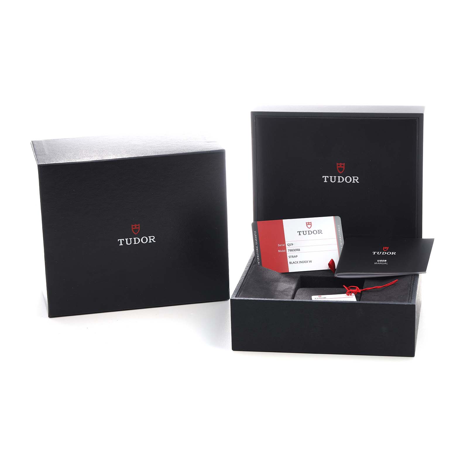 The image shows Tudor Heritage Black Bay 79830RB Men's Stainless Steel Black Dial packaging, including the outer box, an open inner box, and warranty card.