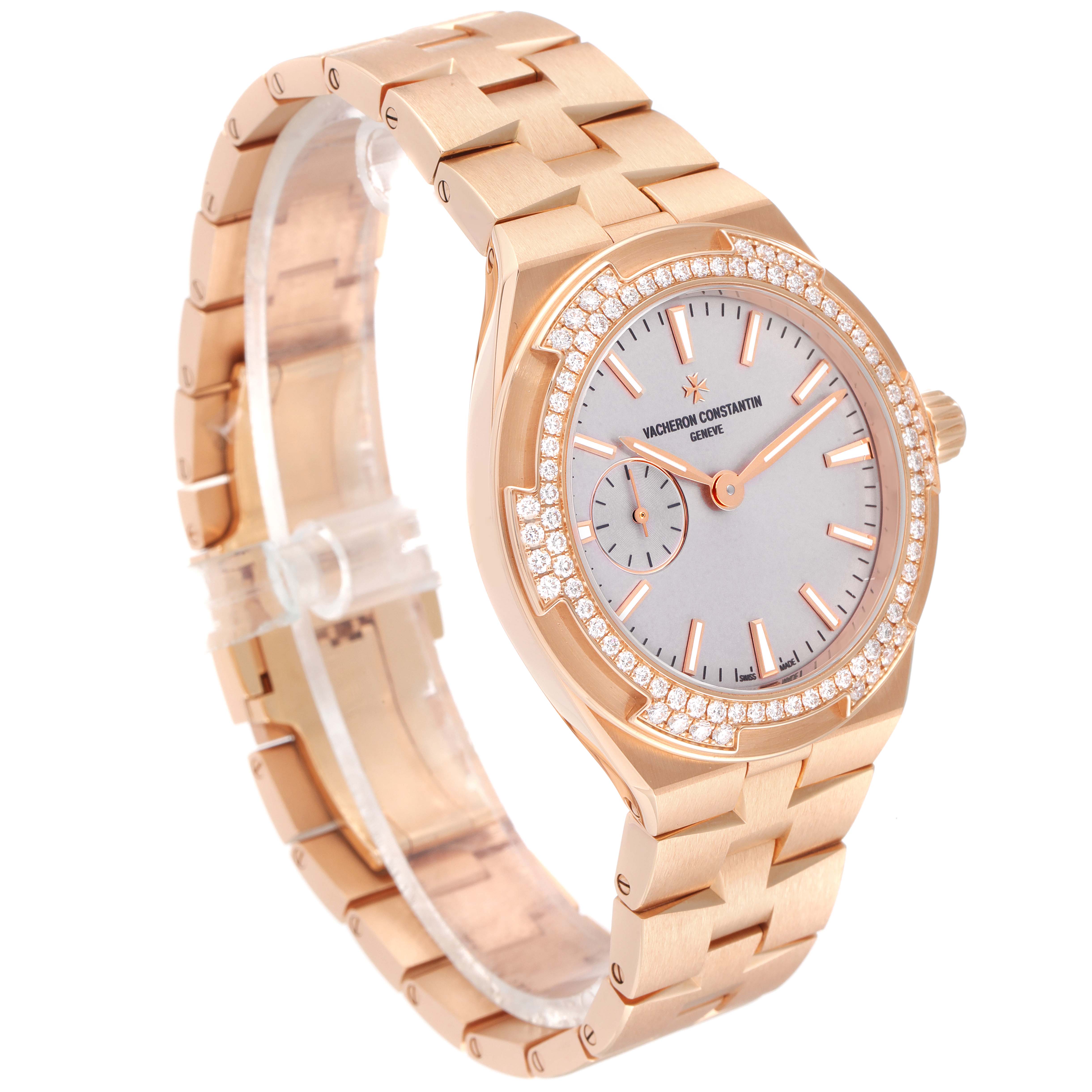 This image shows a Vacheron Constantin Overseas 2305V/100R-B07 Women's Rose Gold Pink Dial 2305V/100R-B07 Women's Rose Gold Pink Dial model watch from a slight side angle, highlighting its rose gold bracelet and diamond bezel.