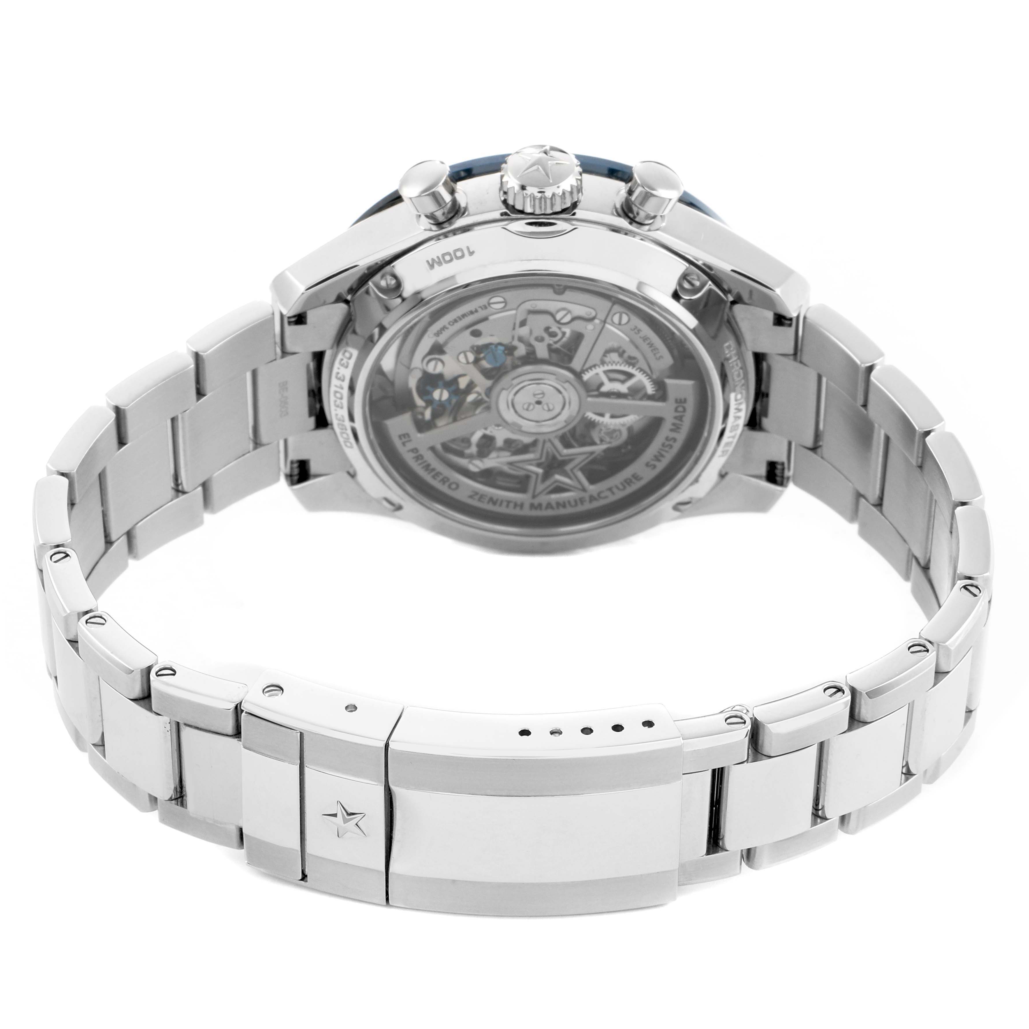 The Zenith Chronomaster 03.3103.3600/69.M3100 Men's Stainless Steel Silver Dial watch is shown from the back, highlighting its transparent case back and metal bracelet.