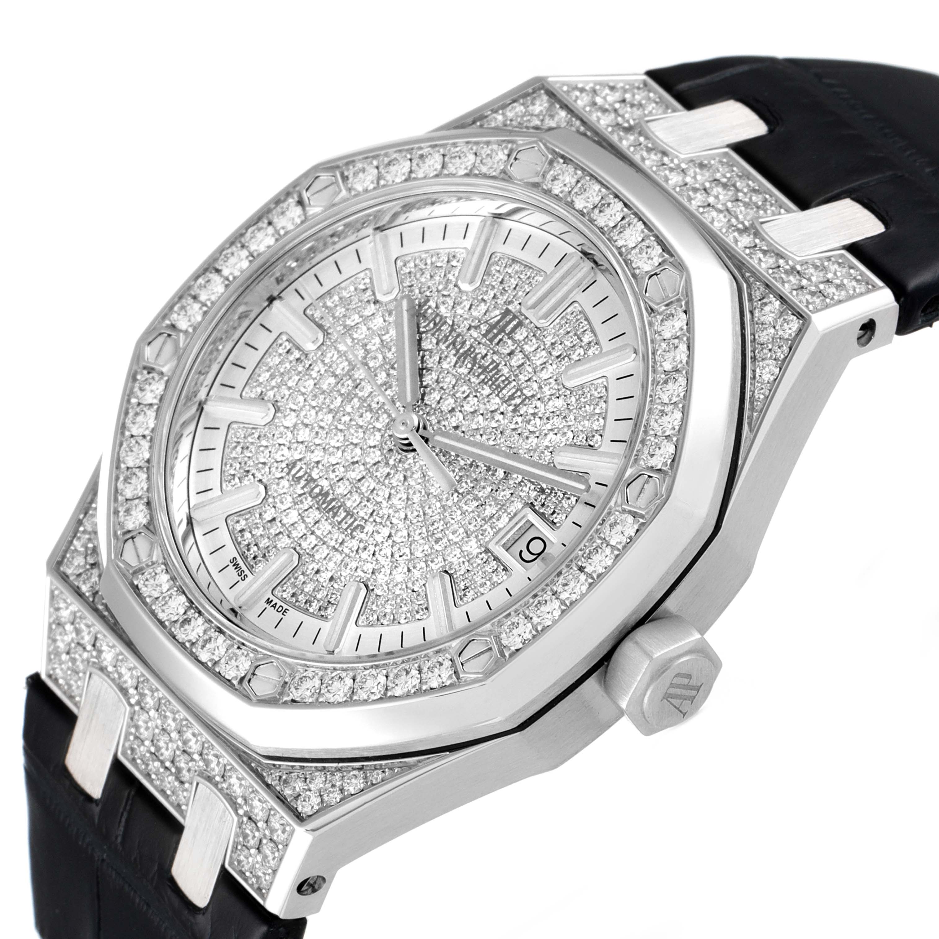 The image shows a diamond-studded Audemars Piguet Royal Oak 15452BC.ZZ.D019CR.01 Men's White Gold Silver Dial 15452BC.ZZ.D019CR.01 Men's White Gold Silver Dial watch at a tilted angle, highlighting the face, bezel, and part of the strap.