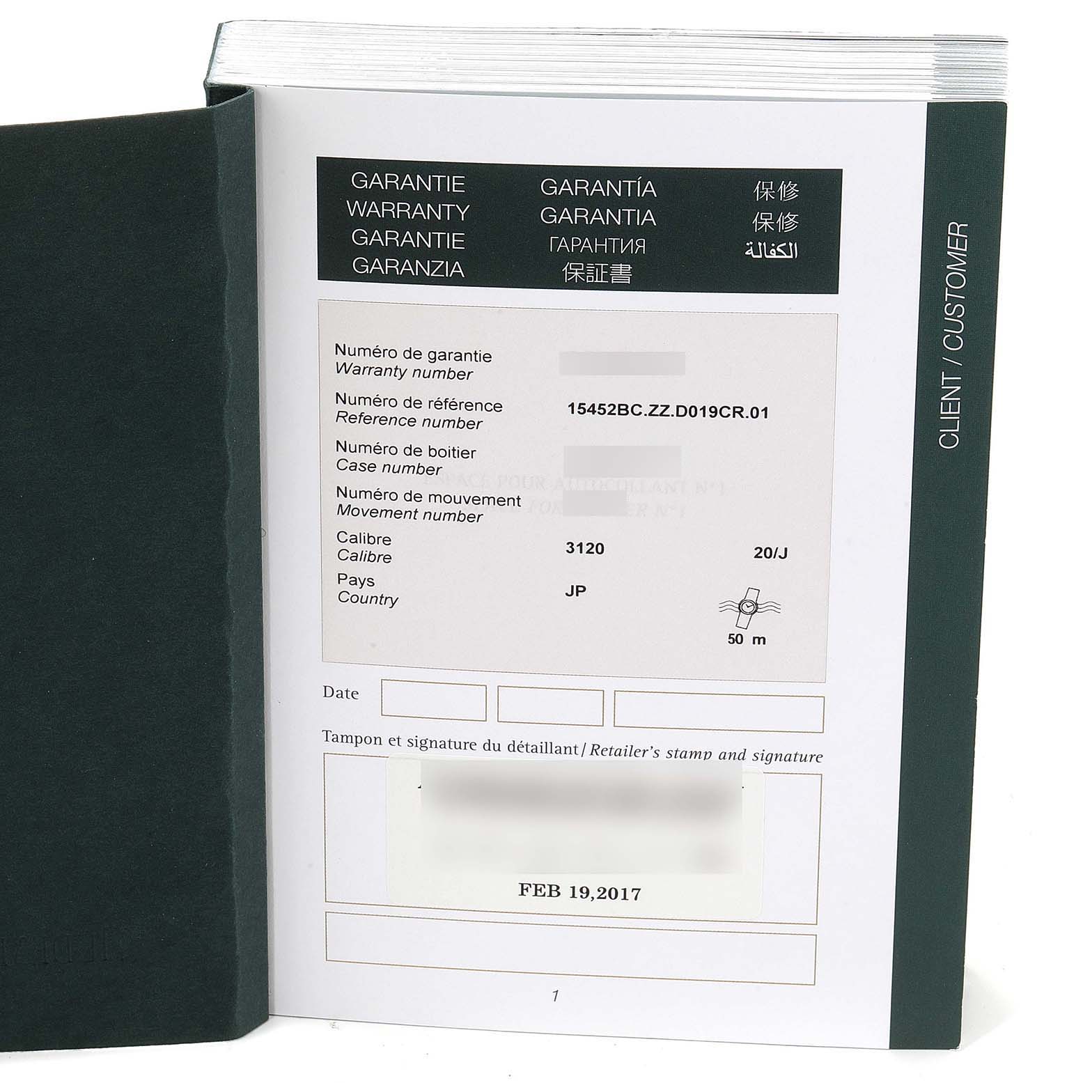 The image shows the warranty booklet for an Audemars Piguet Royal Oak 15452BC.ZZ.D019CR.01 Men's White Gold Silver Dial 15452BC.ZZ.D019CR.01 Men's White Gold Silver Dial watch, with details like the reference number and date of purchase.