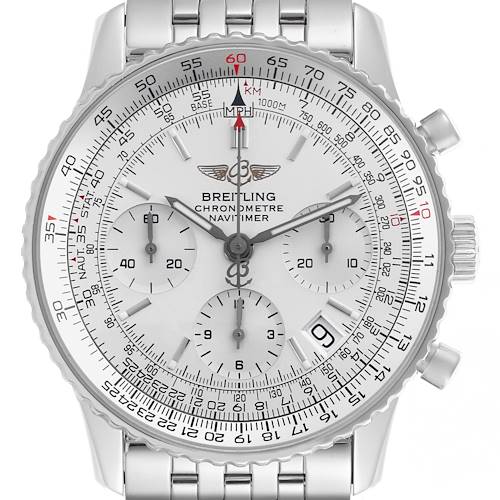 The Breitling Navitimer watch is shown from a front angle, highlighting the face, bezel, subdials, and metal bracelet.