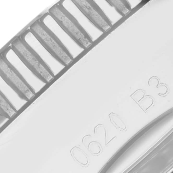 The image shows a close-up of the Breitling Superocean AB2020161C1A1 Men's Stainless Steel Blue Dial AB2020161C1A1 Men's Stainless Steel Blue Dial's bezel and engraved side.