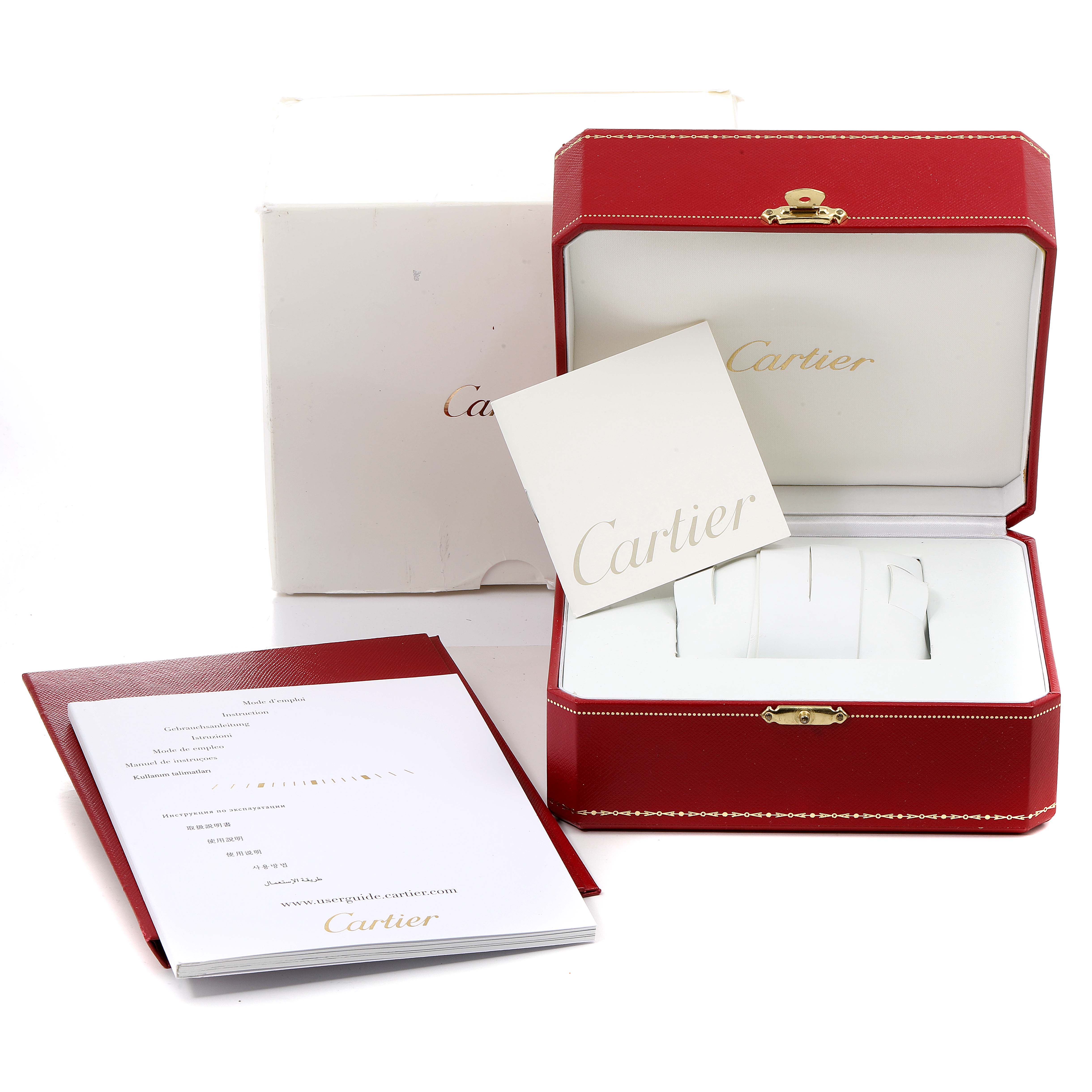 The image shows the Cartier Pasha W31074M7 Men's Stainless Steel White Dial W31074M7 Men's Stainless Steel White Dial model packaging and accessories, including a red case, a white outer box, and documentation.