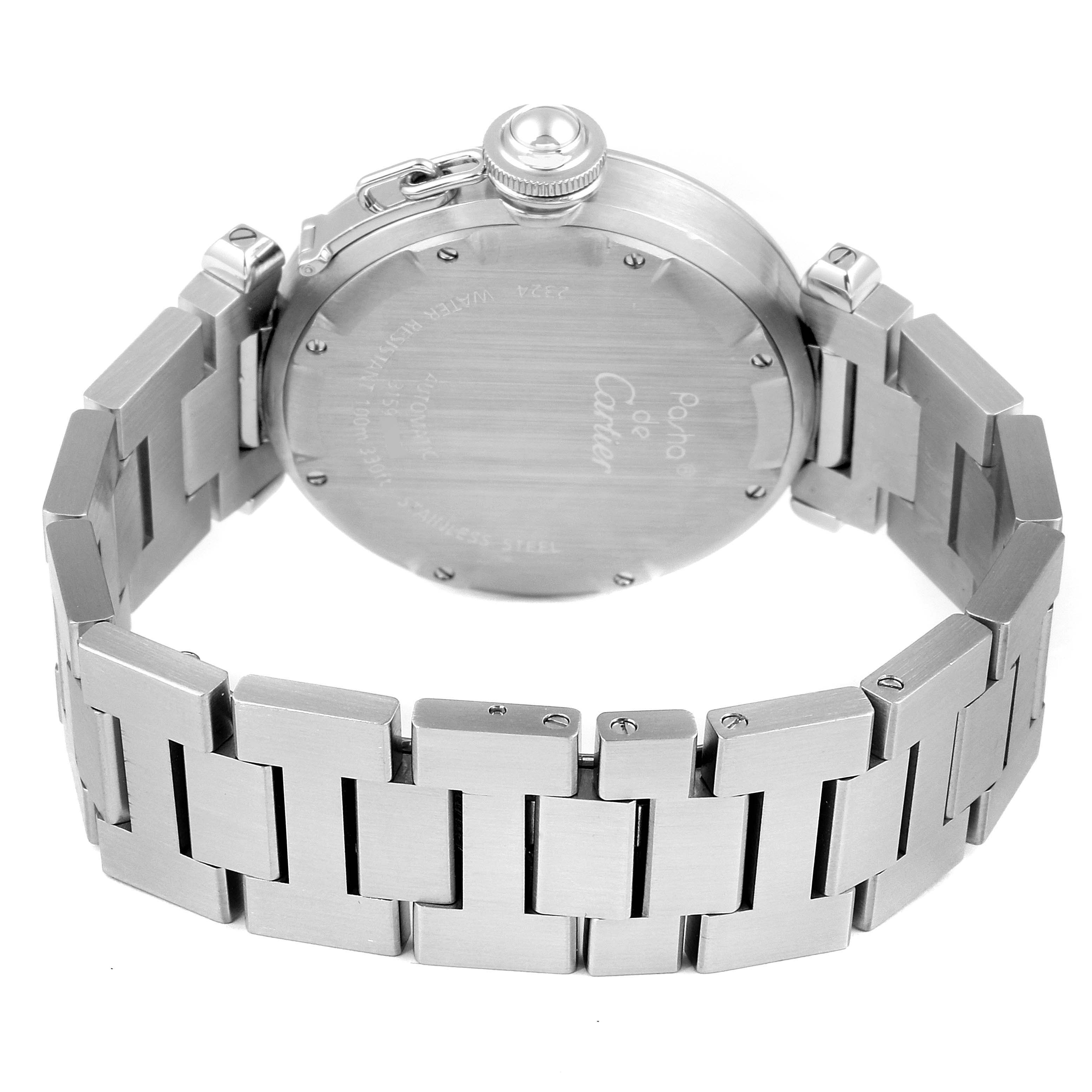 The image shows the back view of a Pasha de Cartier watch, highlighting its case and stainless steel bracelet.