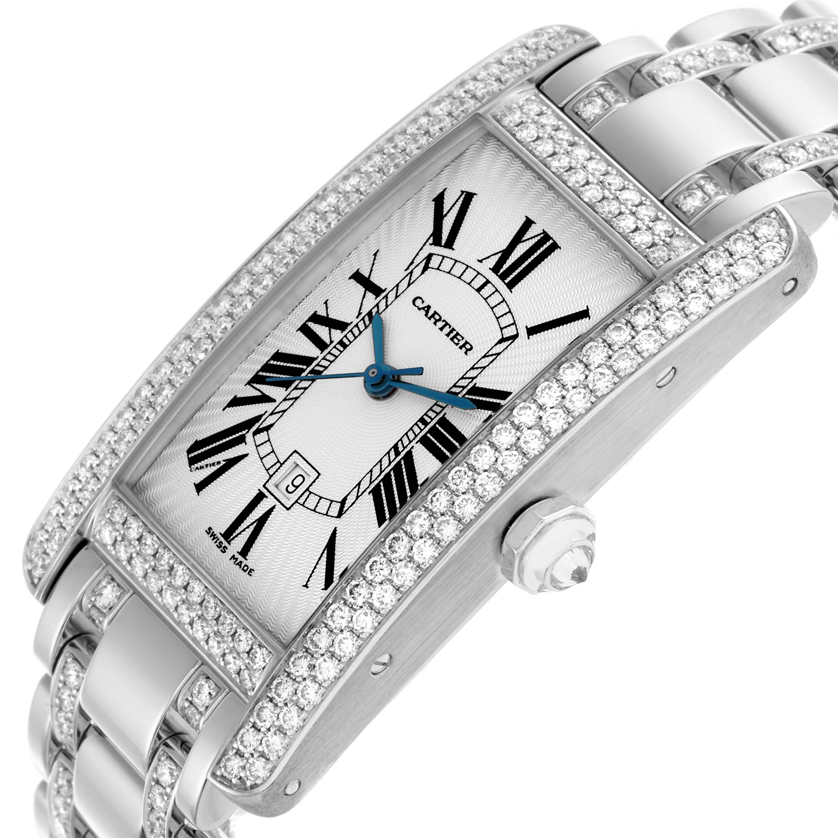 The Cartier Tank Americaine WB7045MP Men's White Gold Silver Dial WB7045MP Men's White Gold Silver Dial watch is shown from a tilted angle, highlighting its diamond bezel, dial, and metal bracelet.