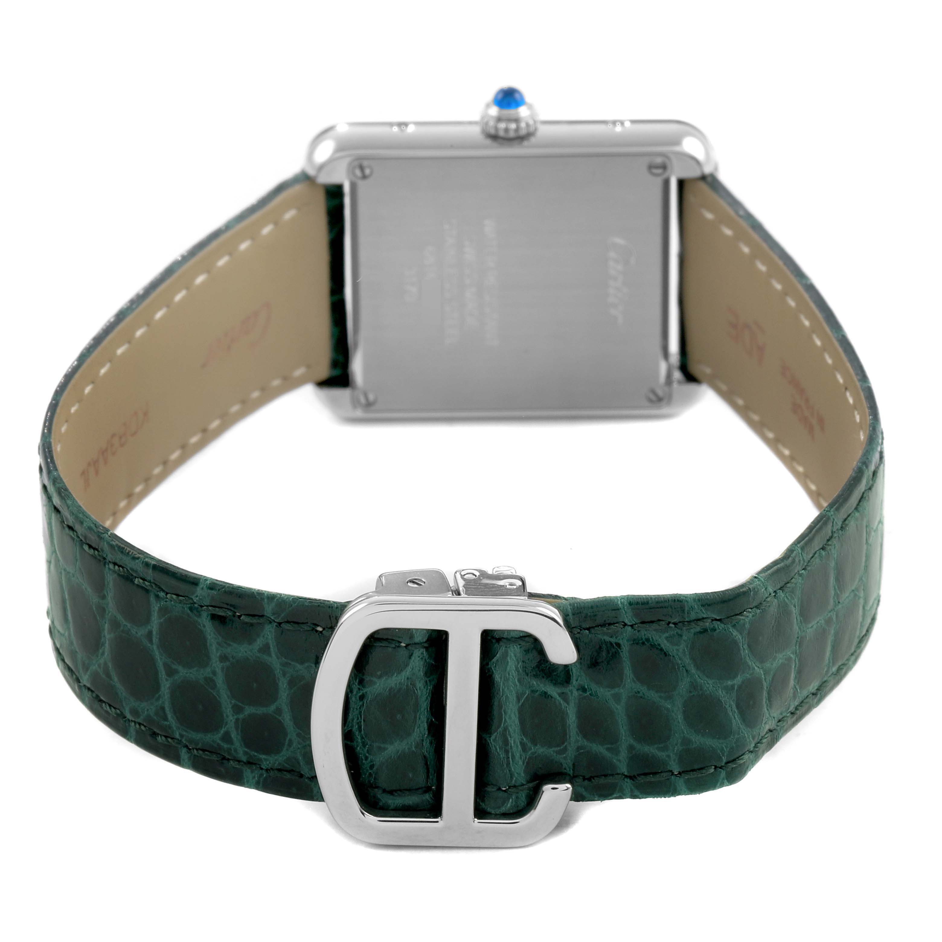 The image shows the back of a Cartier Tank Solo WSTA0030 Women's Stainless Steel Silver Dial watch, displaying its case back, lugs, and green leather strap with a buckle.