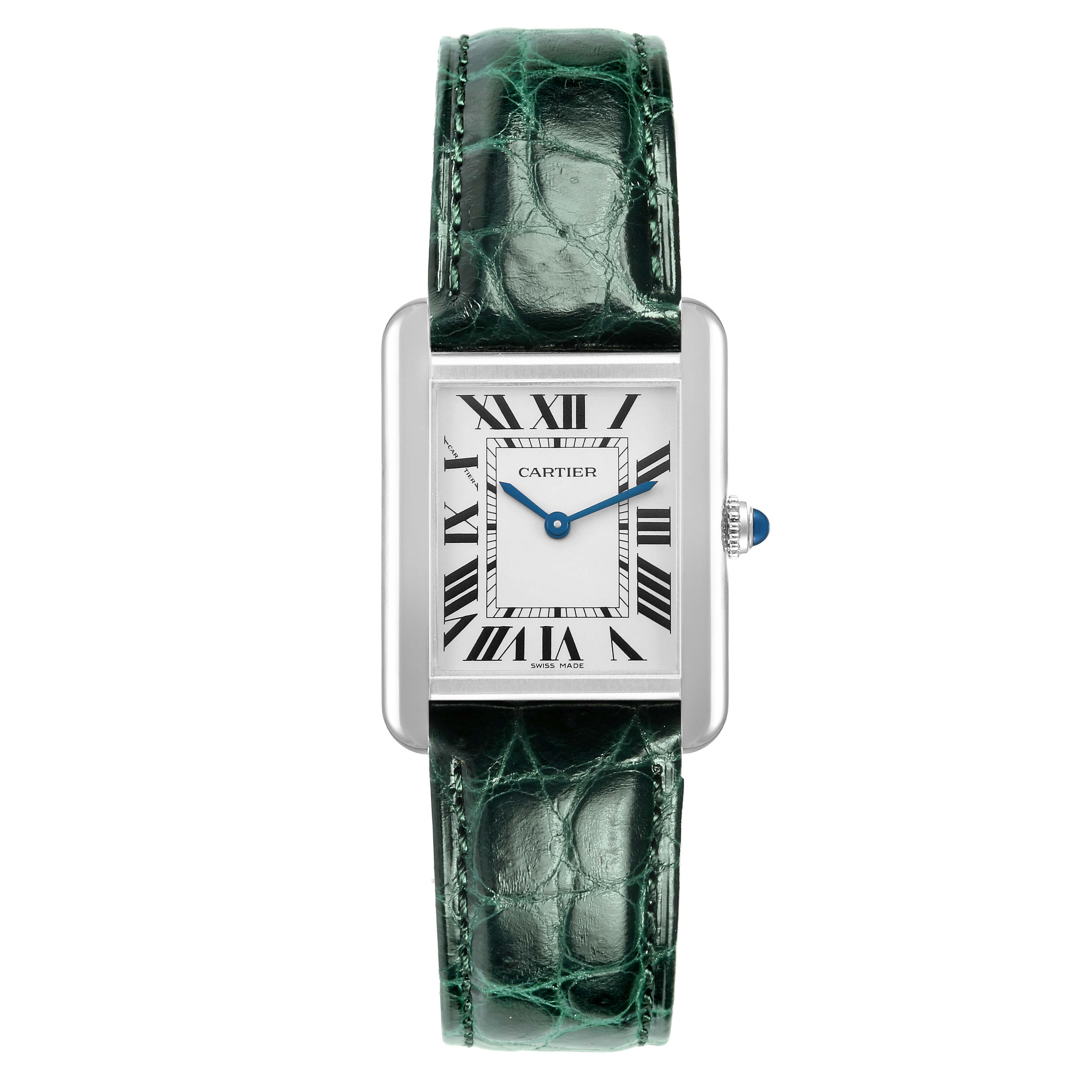 The Cartier Tank Solo WSTA0030 Women's Stainless Steel Silver Dial watch is shown from the front, highlighting its face, green strap, and signature crown detail.