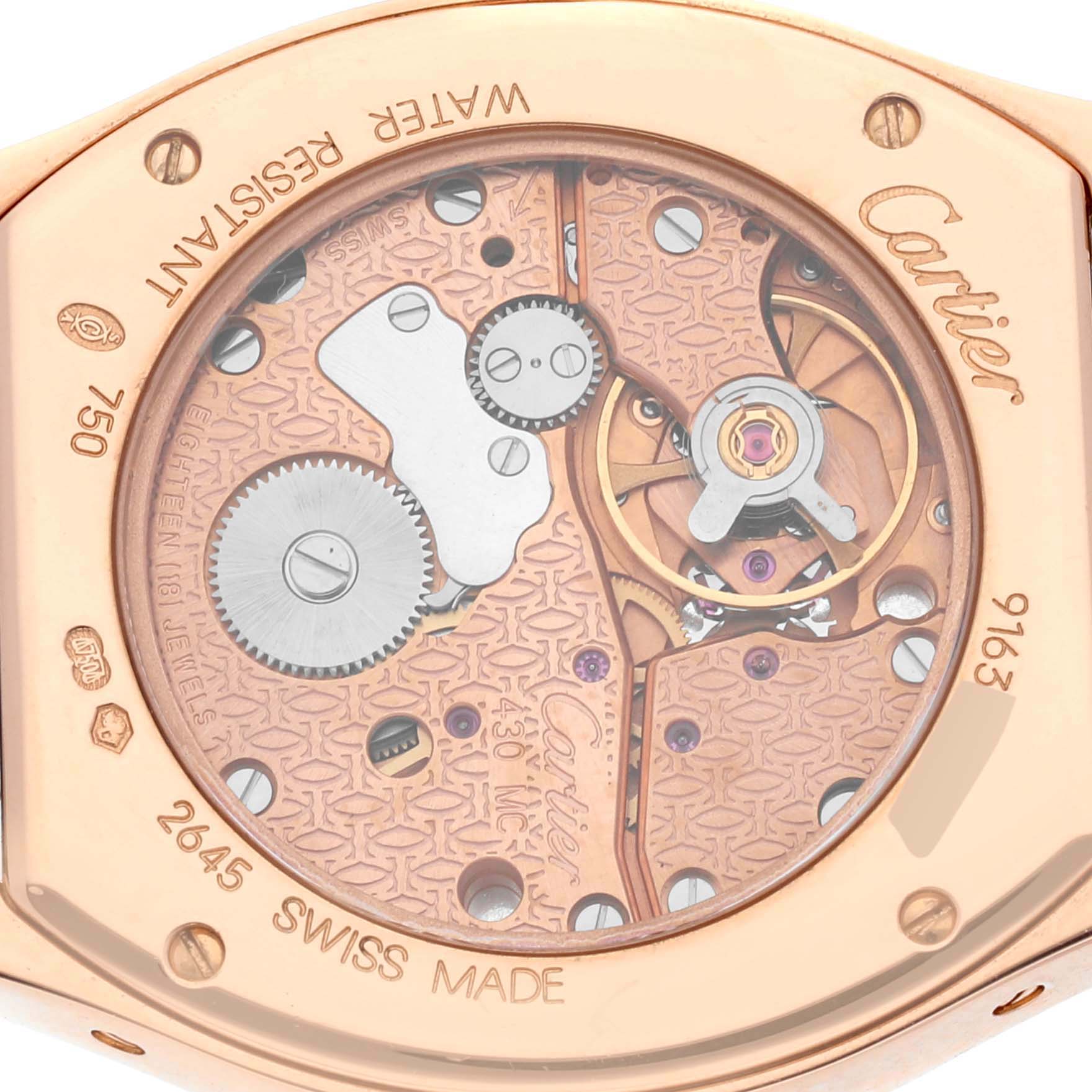 The image shows the back view of a Cartier Tortue WA505031 Women's Rose Gold Silver Dial WA505031 Women's Rose Gold Silver Dial watch, highlighting its intricate movement and internal gears.