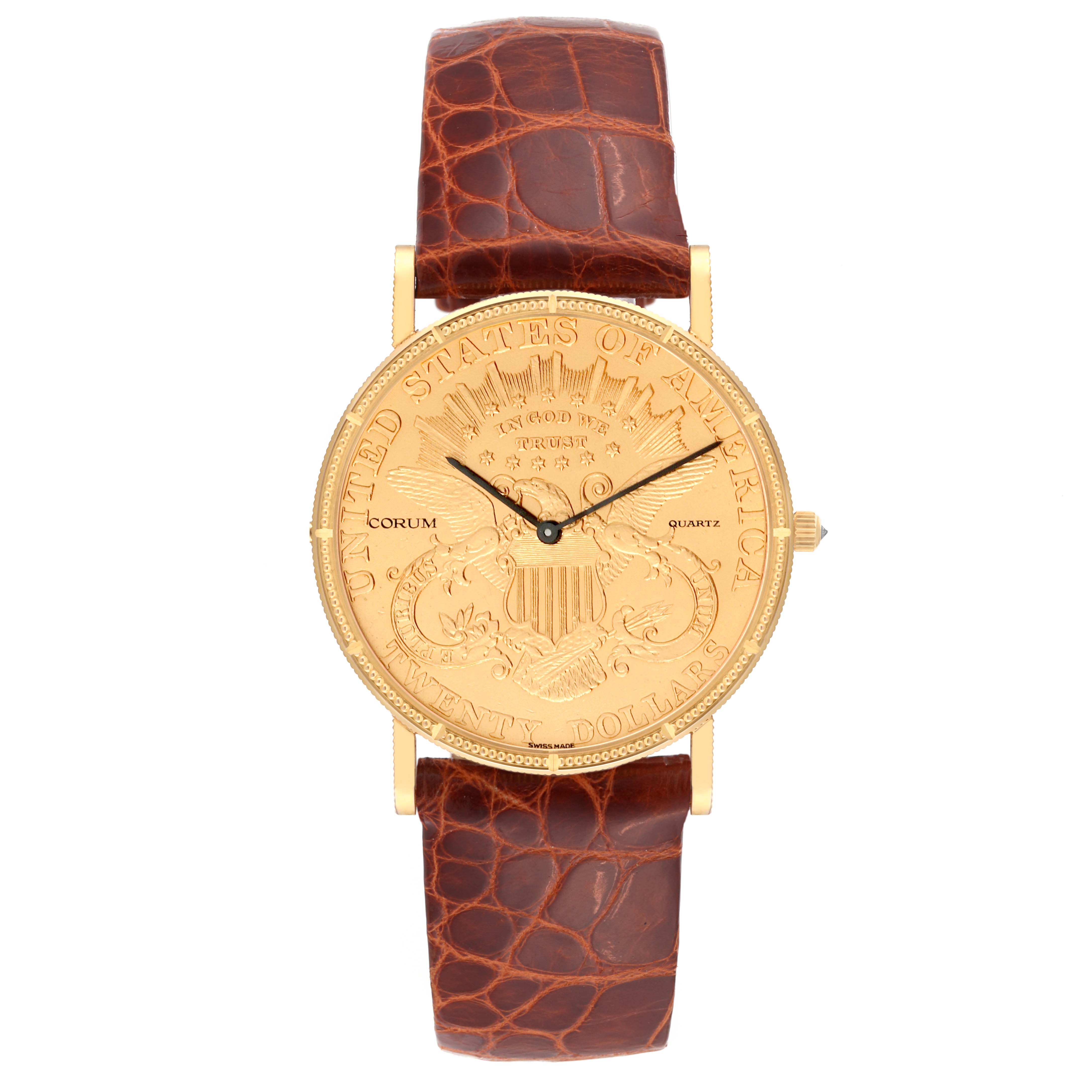 The image shows a front view of the Corum Coin Watch 4708590 Men's Yellow Gold Champagne Dial 4708590 Men's Yellow Gold Champagne Dial model featuring a gold coin face and a brown leather strap.