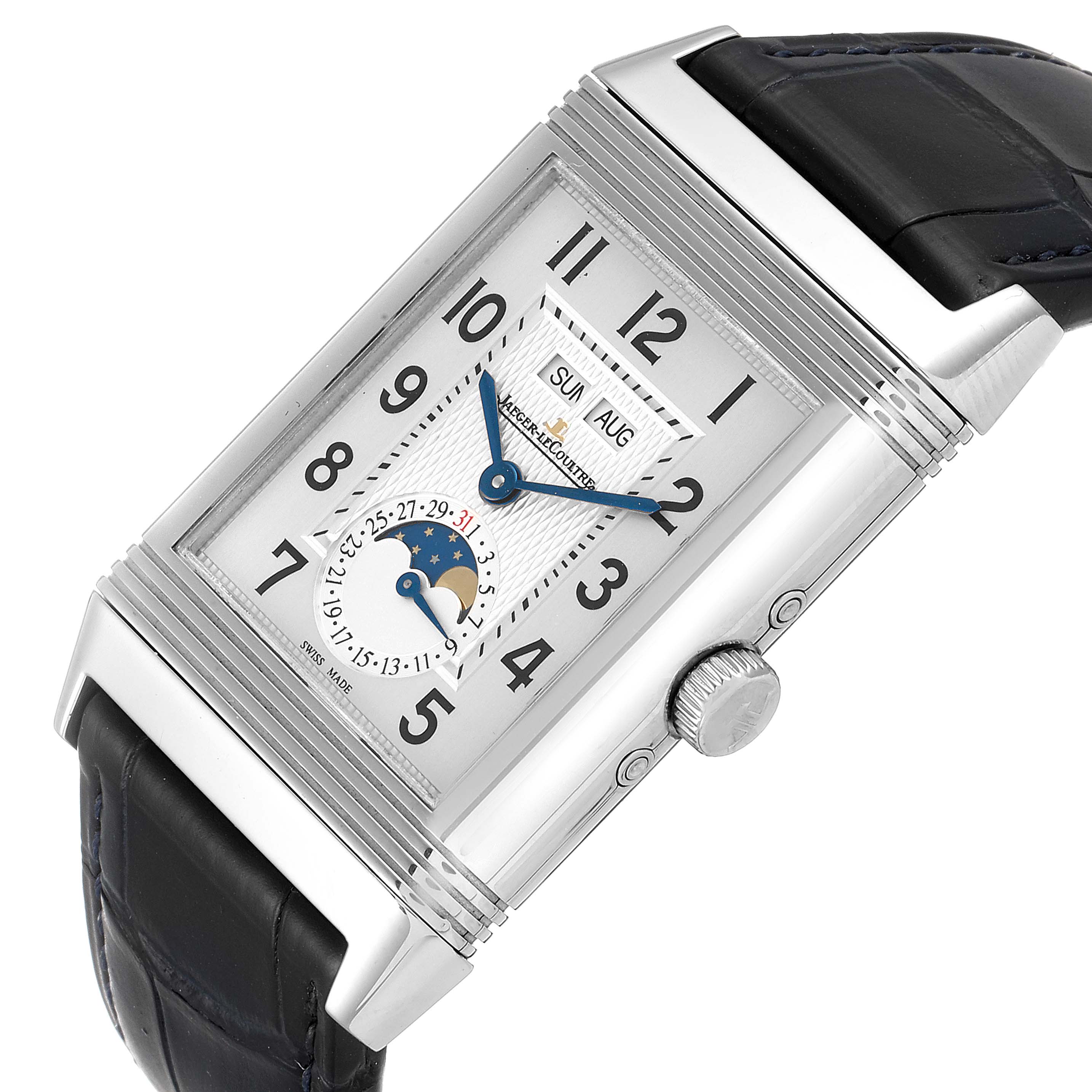 The Reverso watch by Jaeger LeCoultre is displayed at an oblique angle, showcasing the face, clasp, and part of the strap.