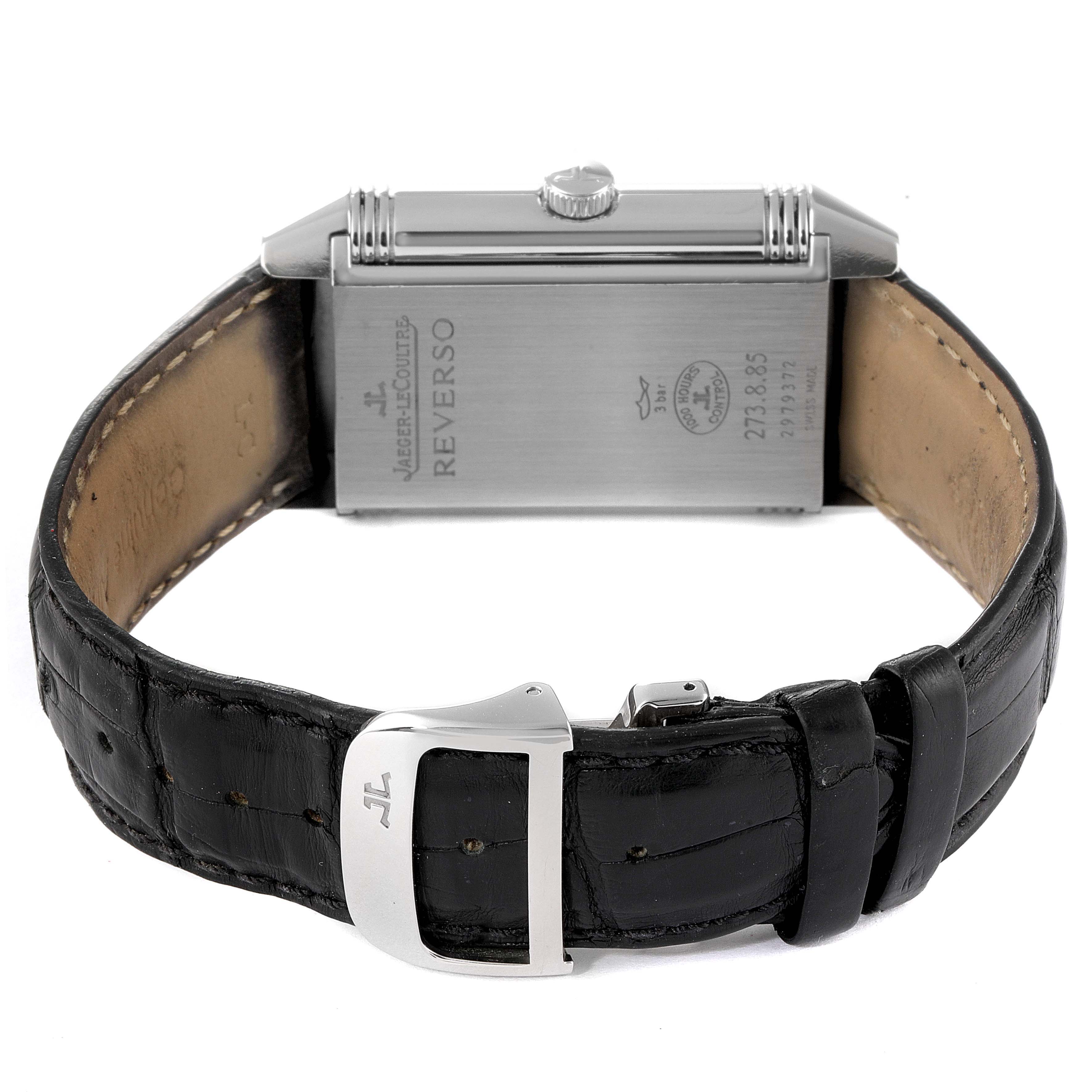 The image shows the back view of a Jaeger LeCoultre Reverso Q3748420 Men
s Stainless Steel Silver Dial Q3748420 Men
s Stainless Steel Silver Dial watch, highlighting the leather strap and the clasp.