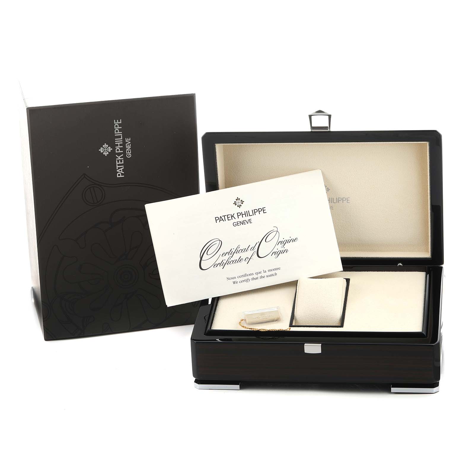 The image shows the Patek Philippe Gondolo 4972/1G-001 Women's White Gold Mother of Pearl Dial watch box and accessories, including a certificate, at a front angle.