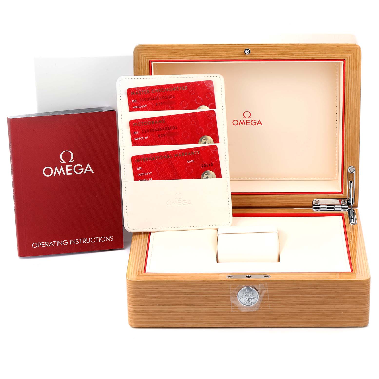 The image shows an Omega Seamaster 210.30.44.51.01.001 Men's Stainless Steel Black Dial 210.30.44.51.01.001 Men's Stainless Steel Black Dial watch box, operating instructions, and three red certification cards in a holder.