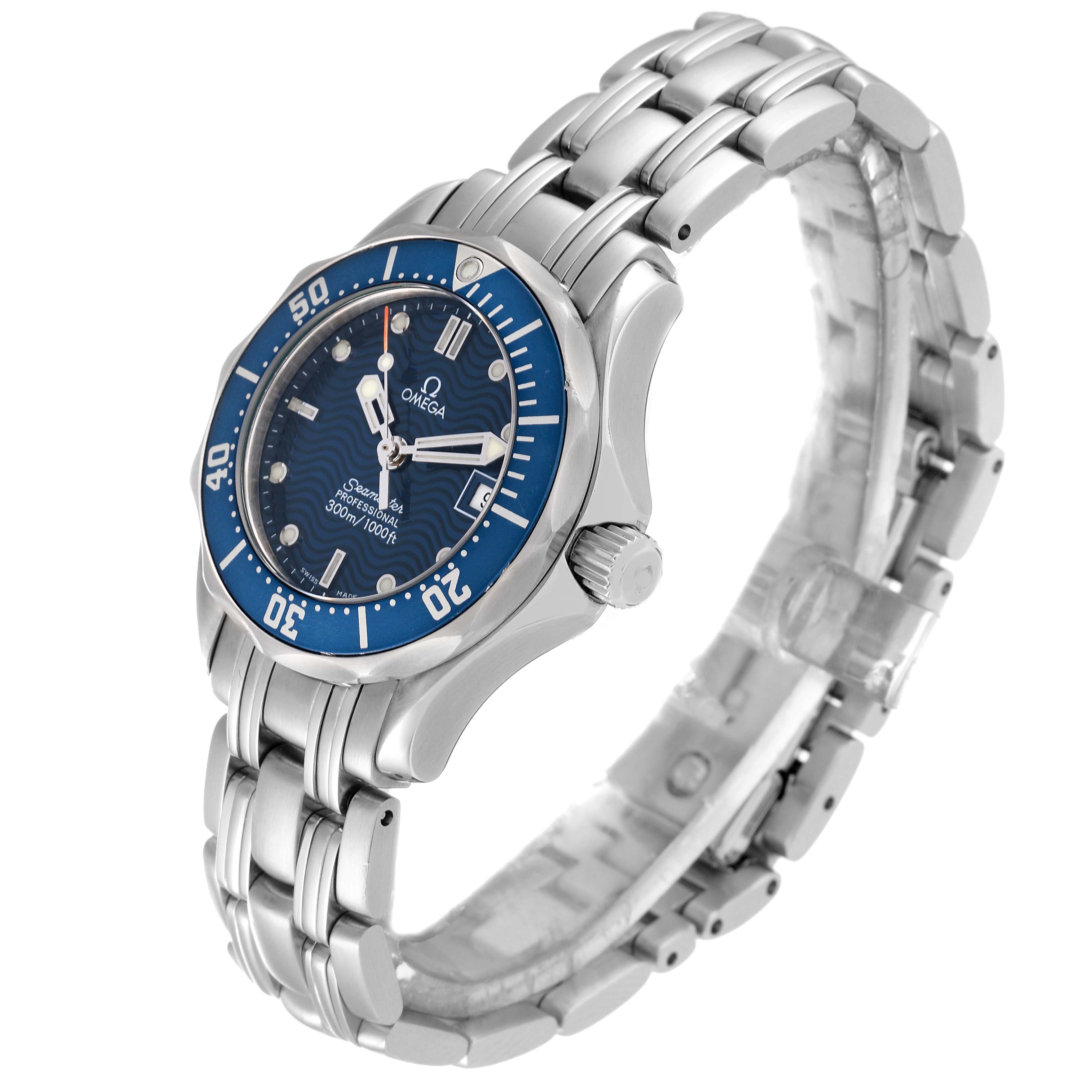 The image shows a side angle of the Omega 2583.80.00 Women's Stainless Steel Blue Dial 2583.80.00 Women's Stainless Steel Blue Dial Seamaster Diver 300M 28mm Steel Ladies Watch model 2583.80.00, highlighting its face, bezel, and bracelet.