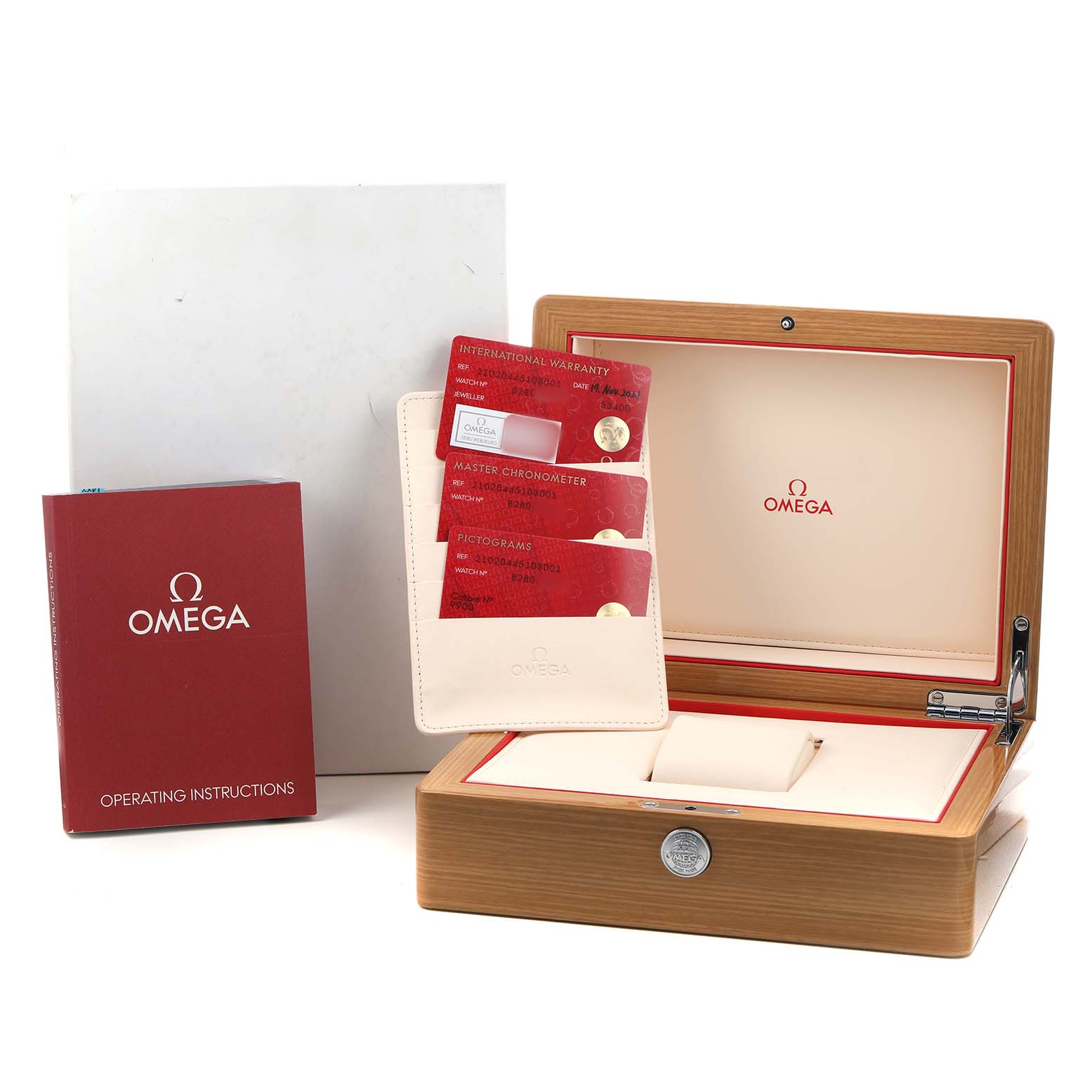 The image shows an Omega Seamaster 210.20.44.51.03.001 Men's Steel and Gold (two tone) Blue Dial watch box, warranty cards, and an instruction manual from a frontal angle.