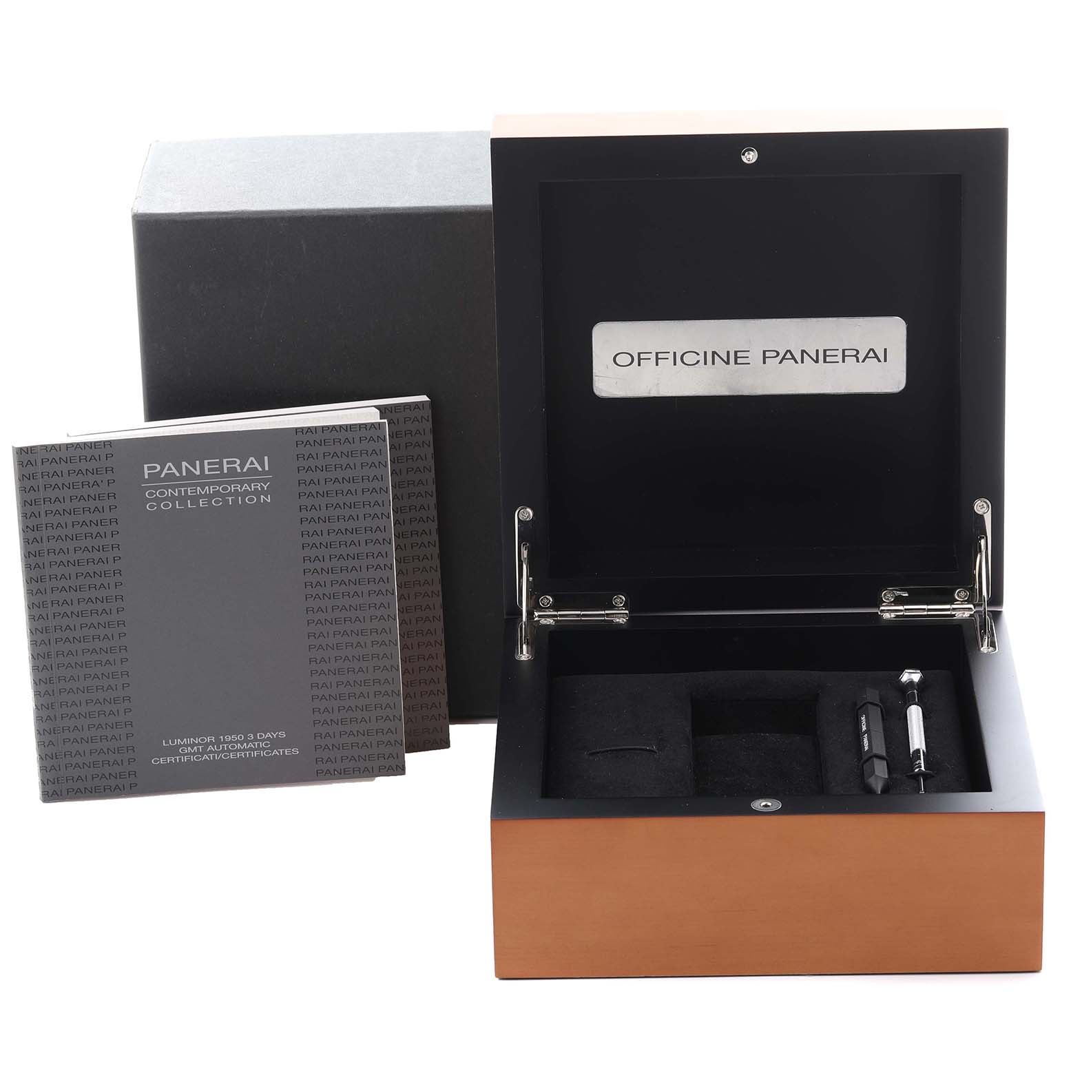 The image shows an open box for a Panerai Luminor PAM00320 Men's Stainless Steel Black Dial PAM00320 Men's Stainless Steel Black Dial watch, including documentation and a tool for strap adjustment.