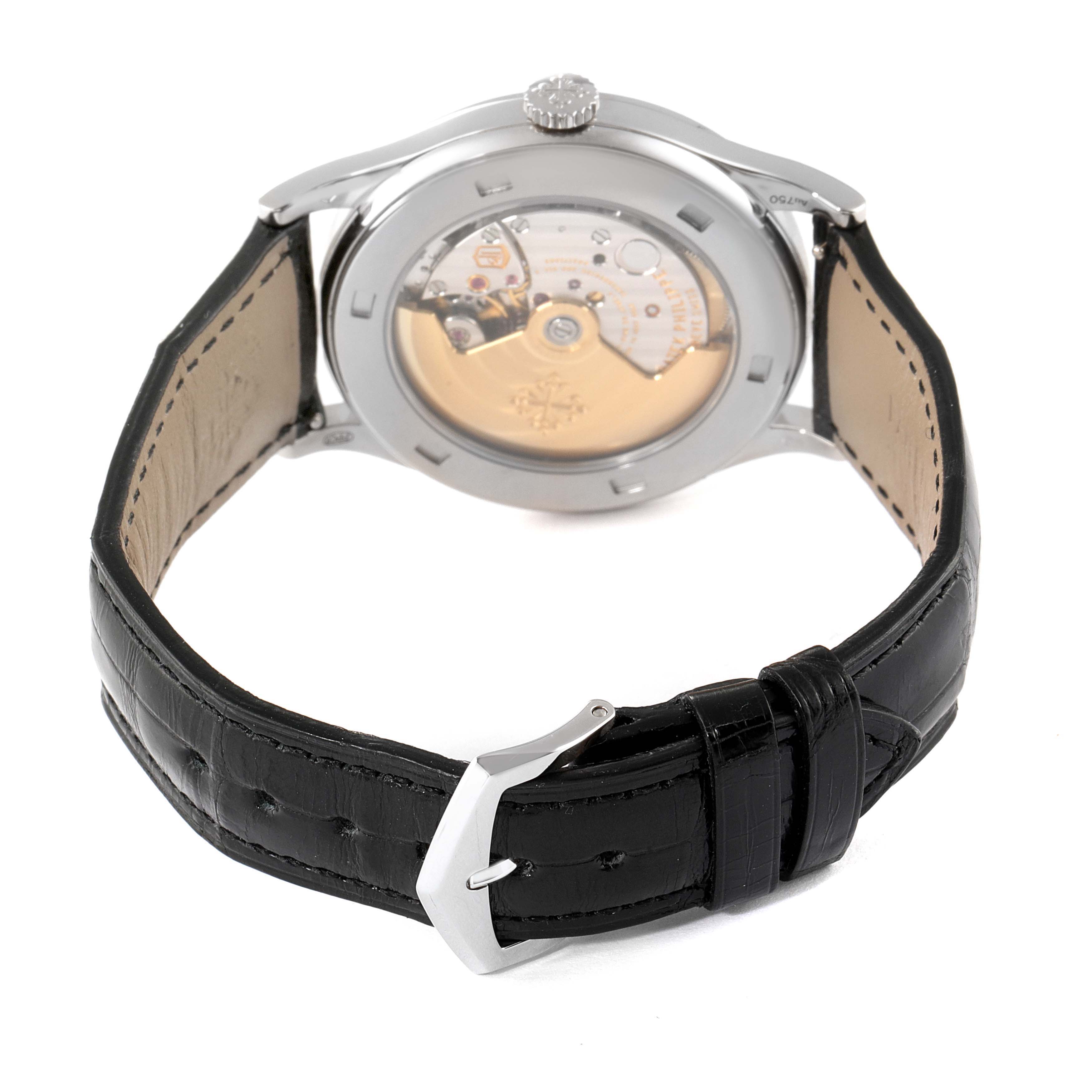 The image shows the back view of a Patek Philippe Calatrava 5296G Men's White Gold Silver Dial 5296G Men's White Gold Silver Dial watch, highlighting its movement and black leather strap.