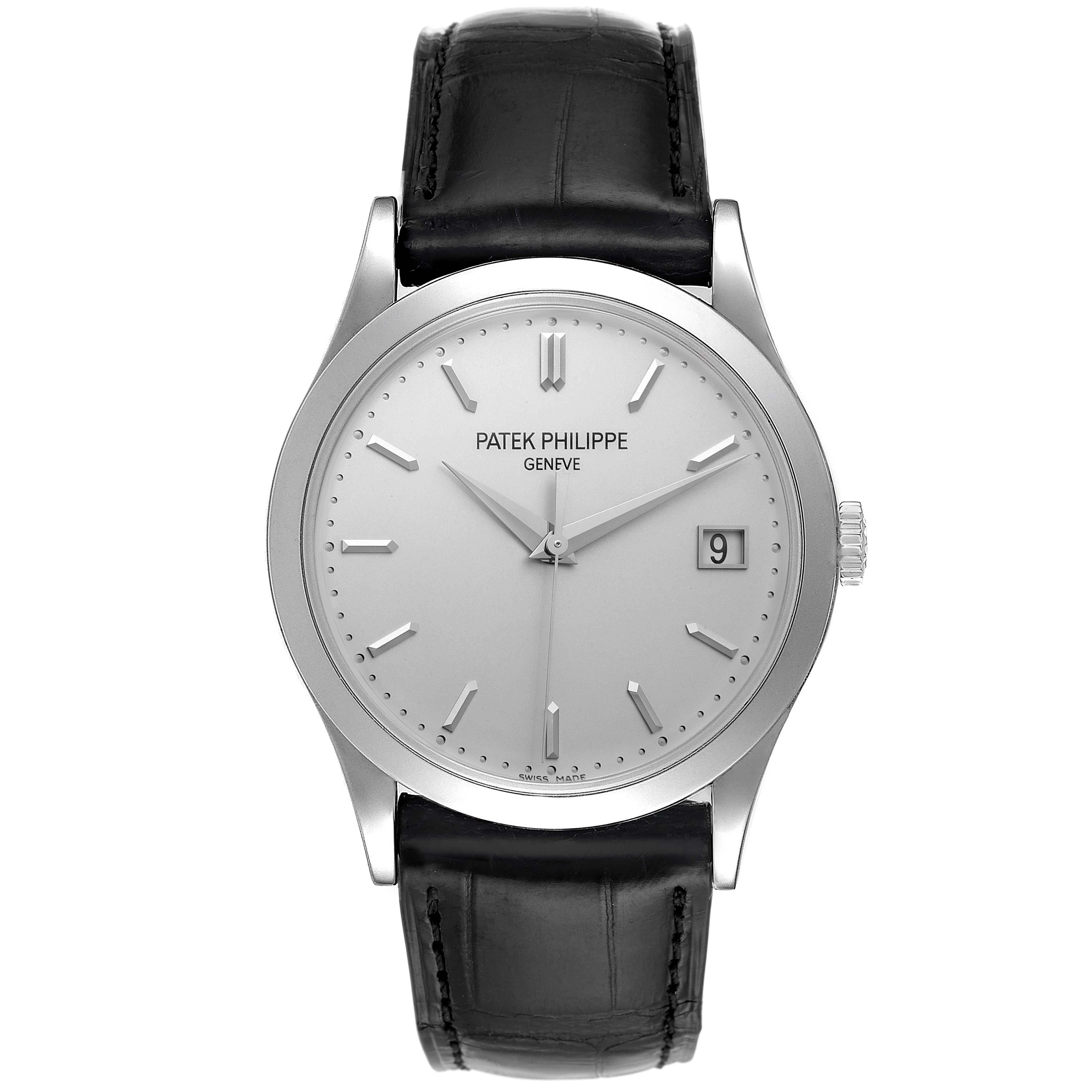The Patek Philippe Calatrava 5296G Men's White Gold Silver Dial 5296G Men's White Gold Silver Dial watch is shown from a front angle, highlighting its dial, hands, date window, and black leather strap.