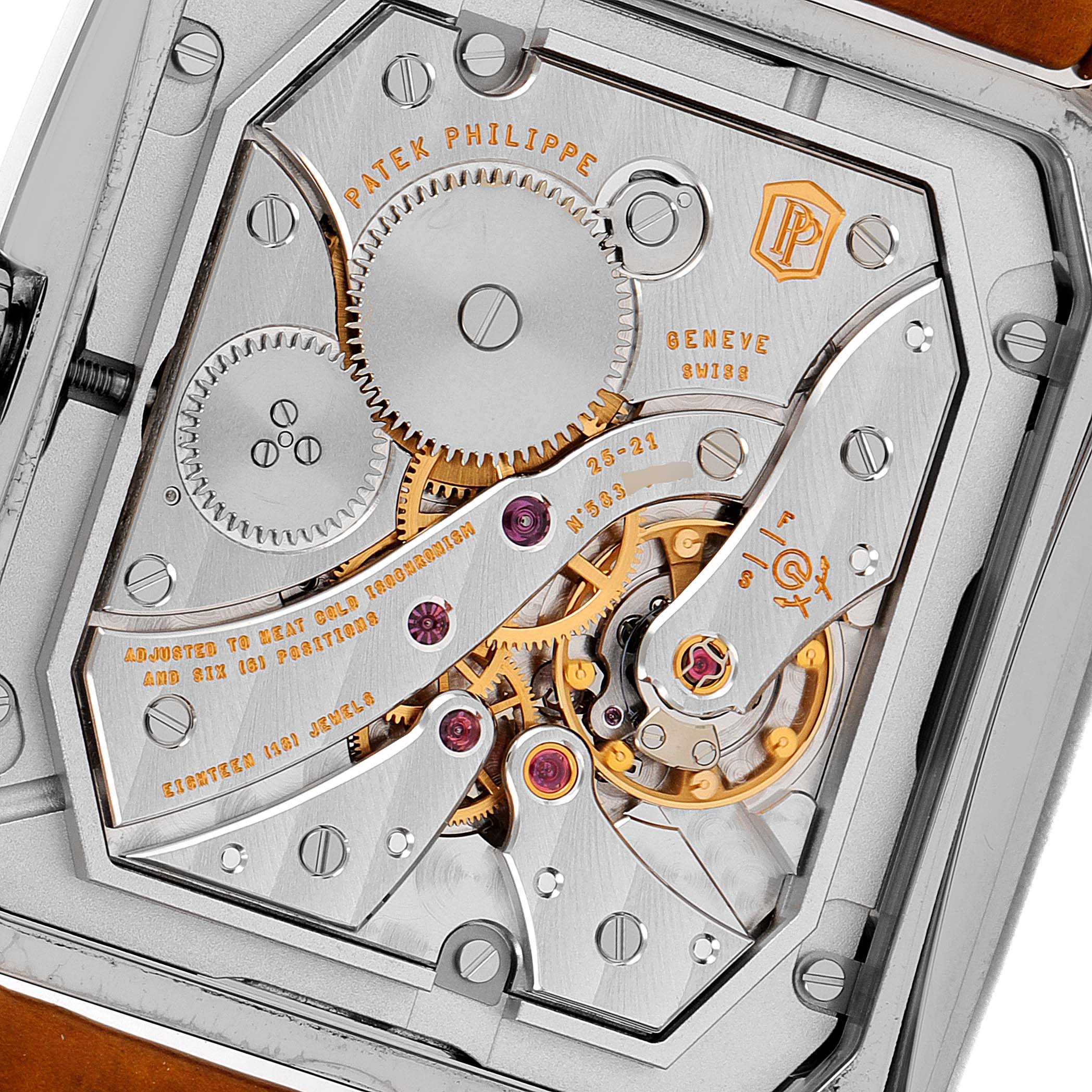 The image shows a close-up of the intricate movement and internal components of a Patek Philippe Gondolo 5124G Men's White Gold Blue Dial 5124G Men's White Gold Blue Dial watch.