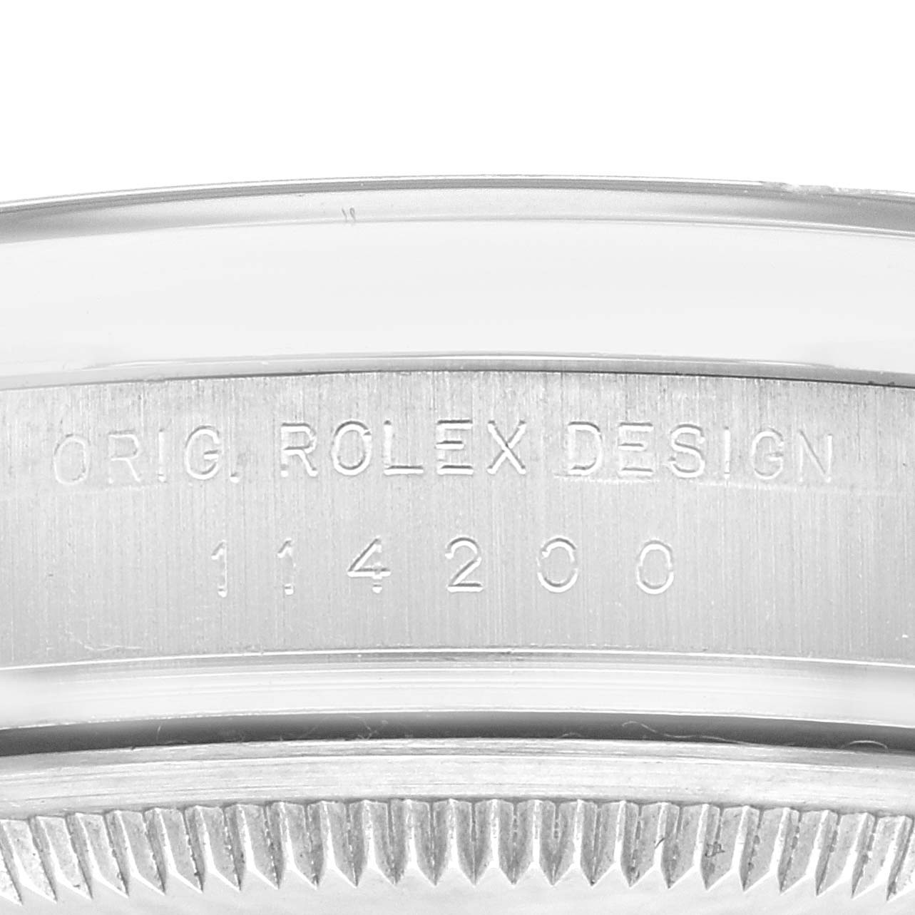 This image shows a close-up of the side engravings on a Rolex Air-King 114200 Men's Stainless Steel Blue Dial 114200 Men's Stainless Steel Blue Dial model's case.