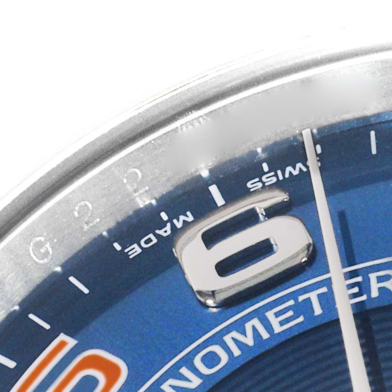 This close-up image of the Rolex Air-King 114200 Men's Stainless Steel Blue Dial 114200 Men's Stainless Steel Blue Dial watch shows part of the dial, including the 6 o'clock marker, and part of the second hand.