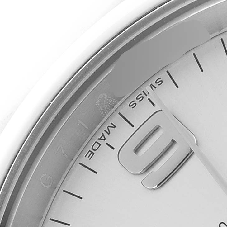 The image shows a close-up of the dial edge of a Rolex Air-King 114200 Men's Stainless Steel Silver Dial 114200 Men's Stainless Steel Silver Dial, highlighting the "SWISS MADE" text and part of the 3 o'clock marker.