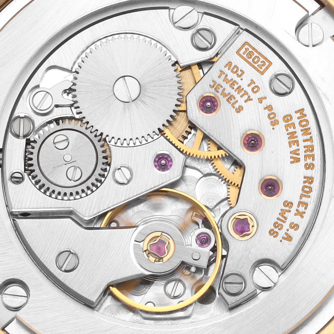 This image shows the movement of a Rolex Cellini 5115 Men's Yellow Gold Silver Dial 5115 Men's Yellow Gold Silver Dial watch, highlighting gears and jewels from a close-up top-down angle.