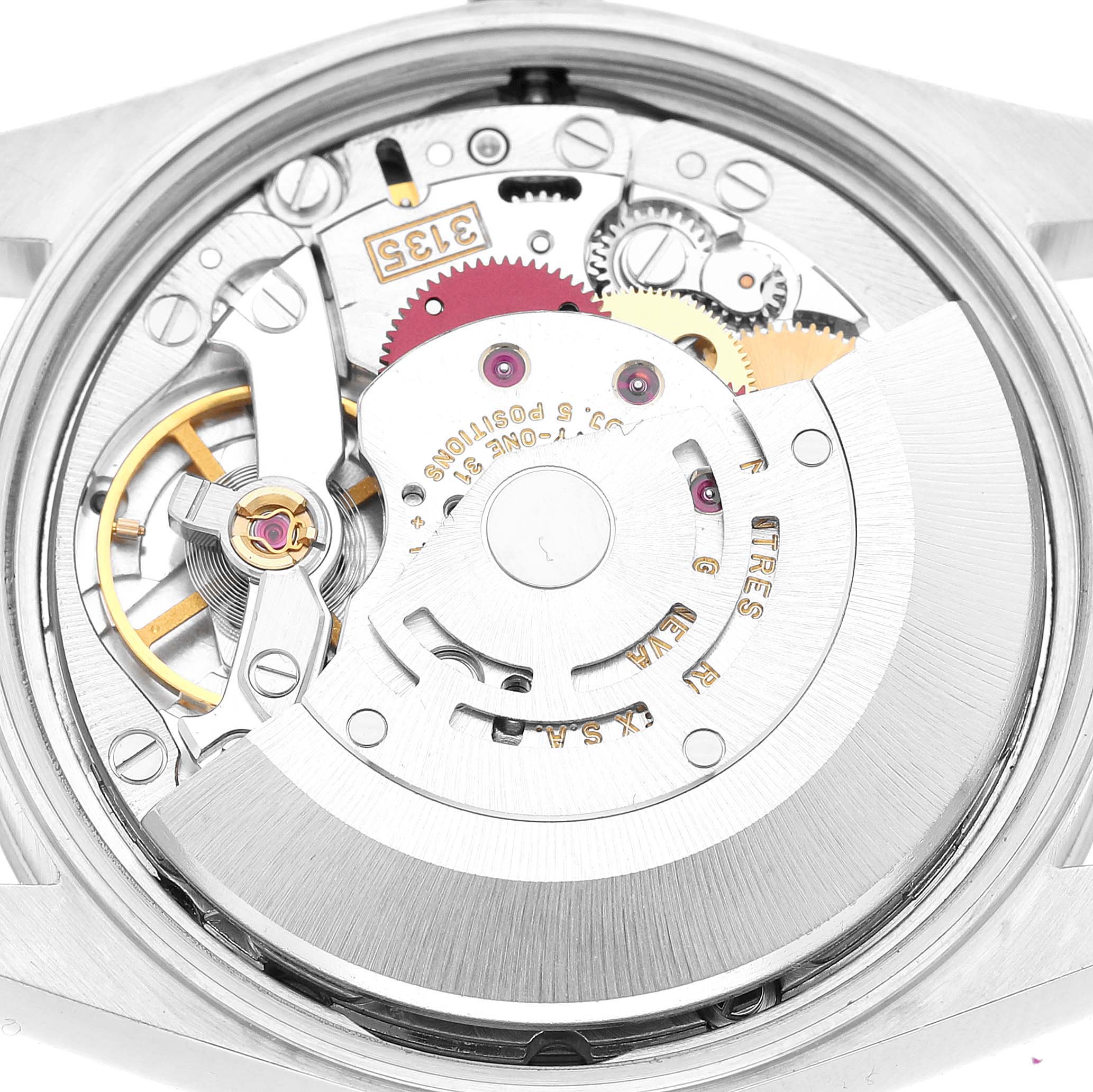 The image shows the movement of a Rolex Date 15200 Men's Stainless Steel White Dial model watch, highlighting its internal gears and rotor from a top-down angle.
