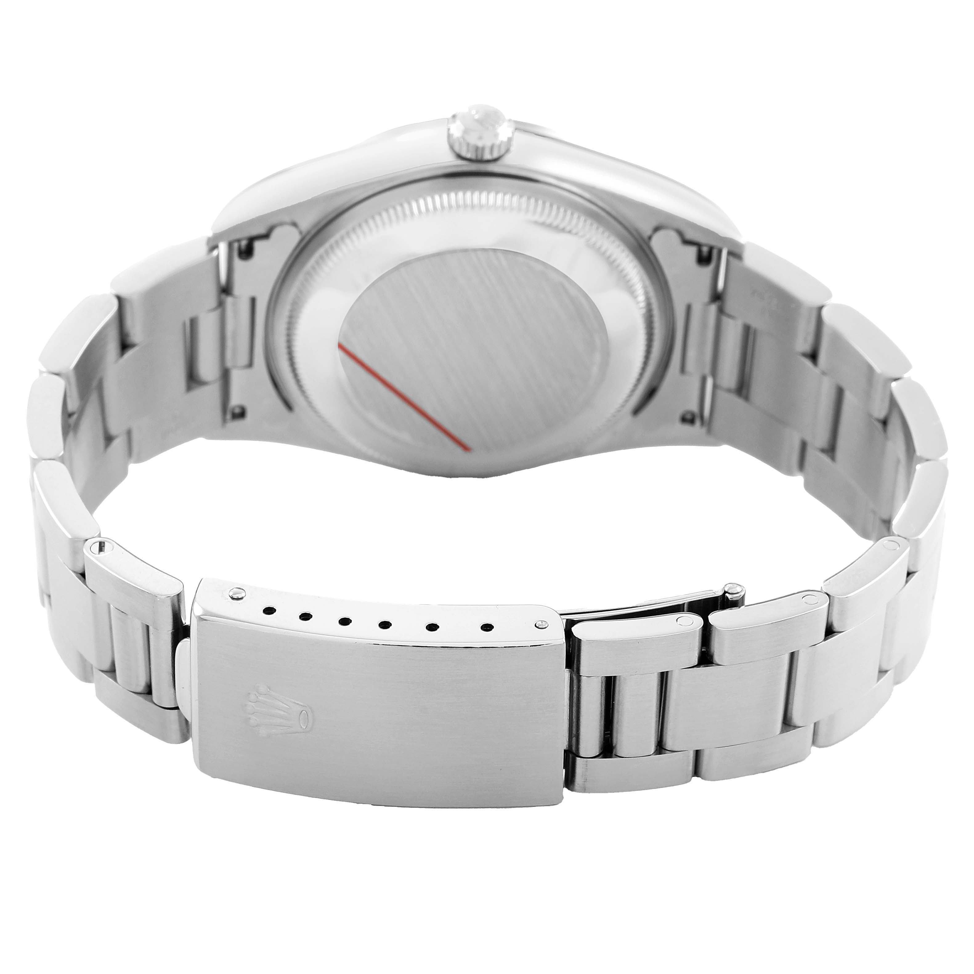 The image shows the back view of a Rolex Date 15200 Men's Stainless Steel White Dial model, highlighting the clasp, bracelet, case back, and winding crown.