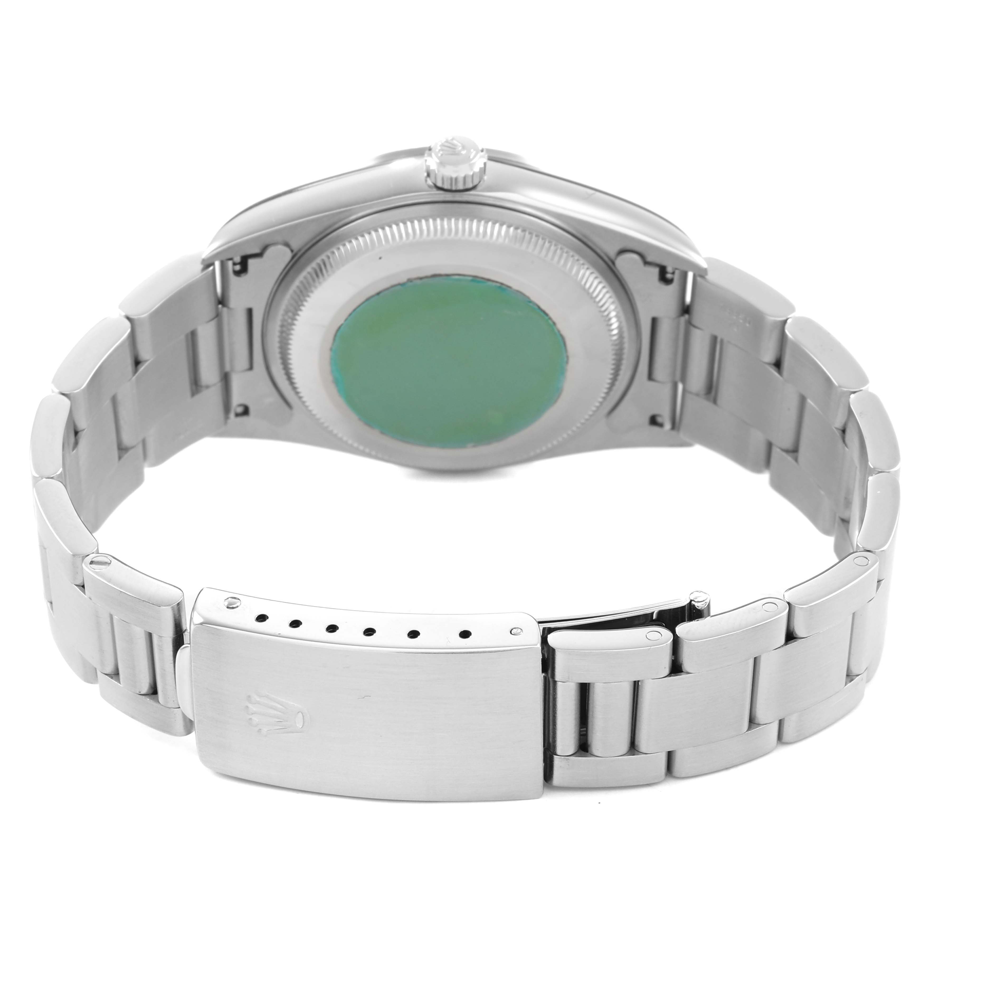 The image shows the back view of a Rolex Date 15200 Men's Stainless Steel White Dial model watch, highlighting the case back, bracelet, and clasp with visible branding.