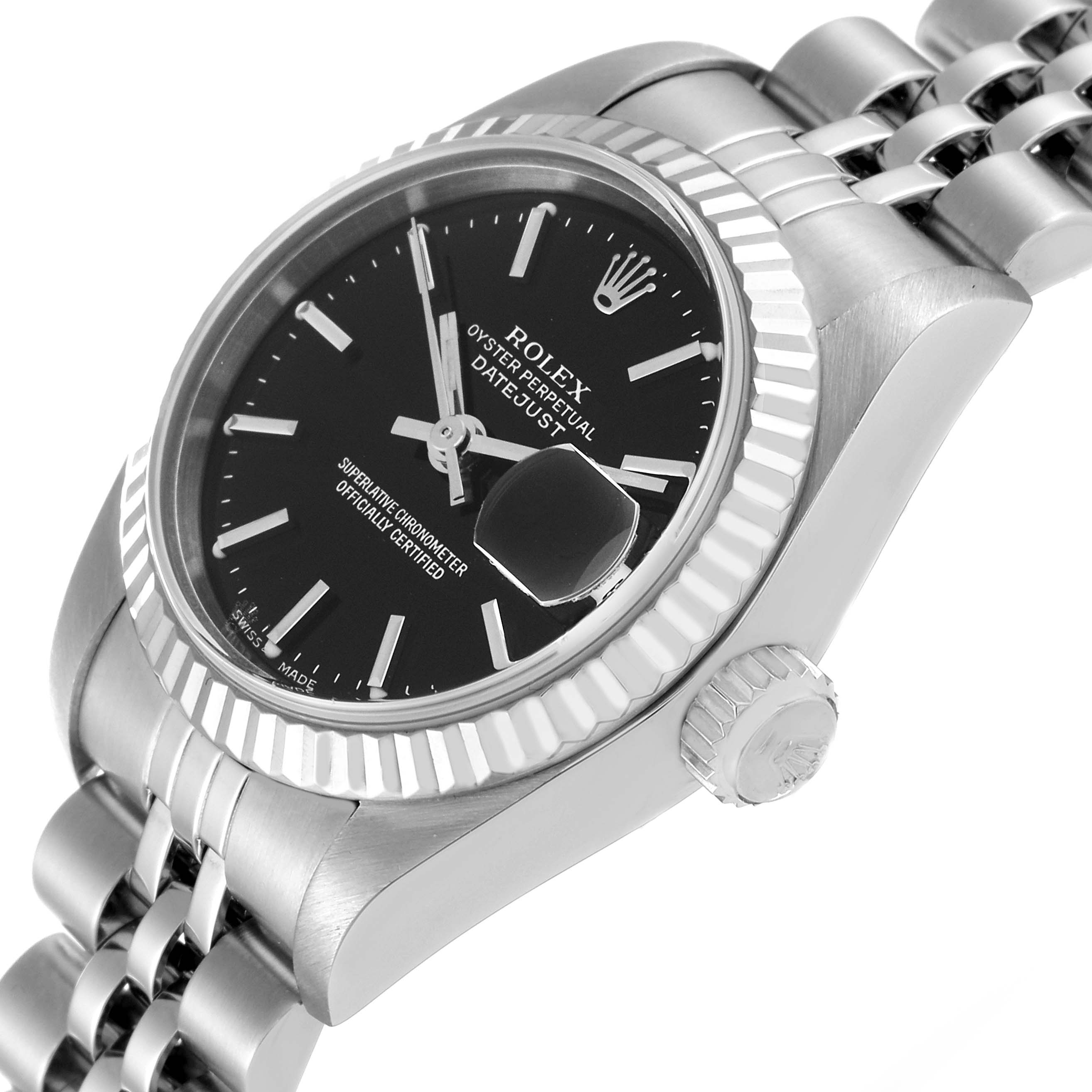 The image shows a close-up side angle of a Rolex Datejust 79174 Women's Stainless Steel Black Dial 79174 Women's Stainless Steel Black Dial watch, highlighting the dial, bezel, crown, and part of the bracelet.