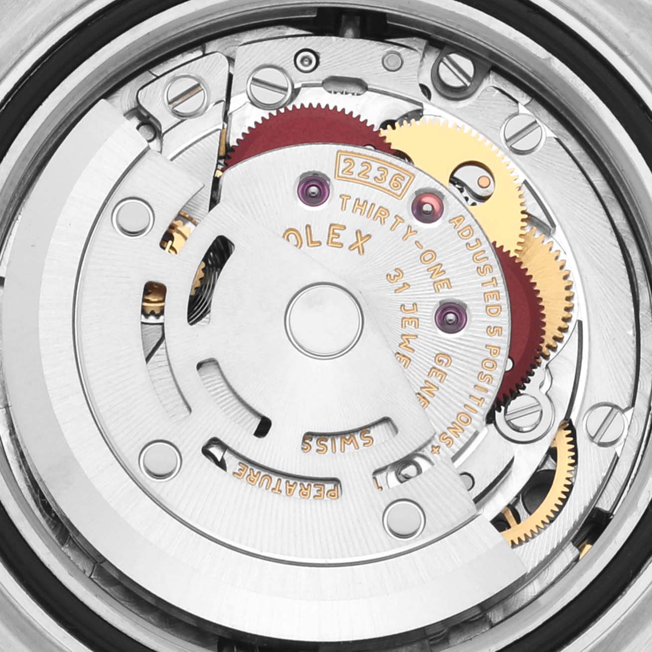 The image shows an up-close view of the Rolex Datejust 279174 Women's Stainless Steel Grey Dial 279174 Women's Stainless Steel Grey Dial movement, highlighting the gears and internal mechanism.